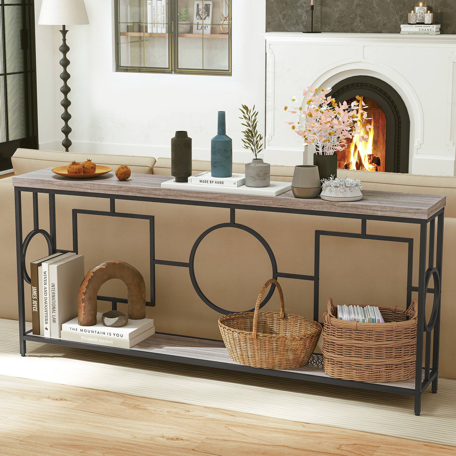 Sure, here is the corrected and grouped text from the image:

**Books:**
- "James Joyce"
- "International Law"
- "The Mountain is You" by Elizabeth Gaskell
- "Made by Hand"

**Brands:**
- "Chanel"

**Other Text:**
- "Lee" (on the framed photo on the shelf)