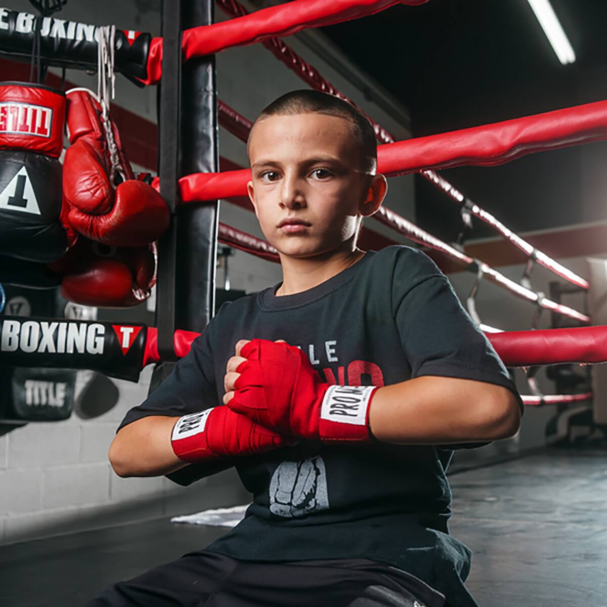 E & J KIN  
BOXING TITLE  
TITLE  
PRO