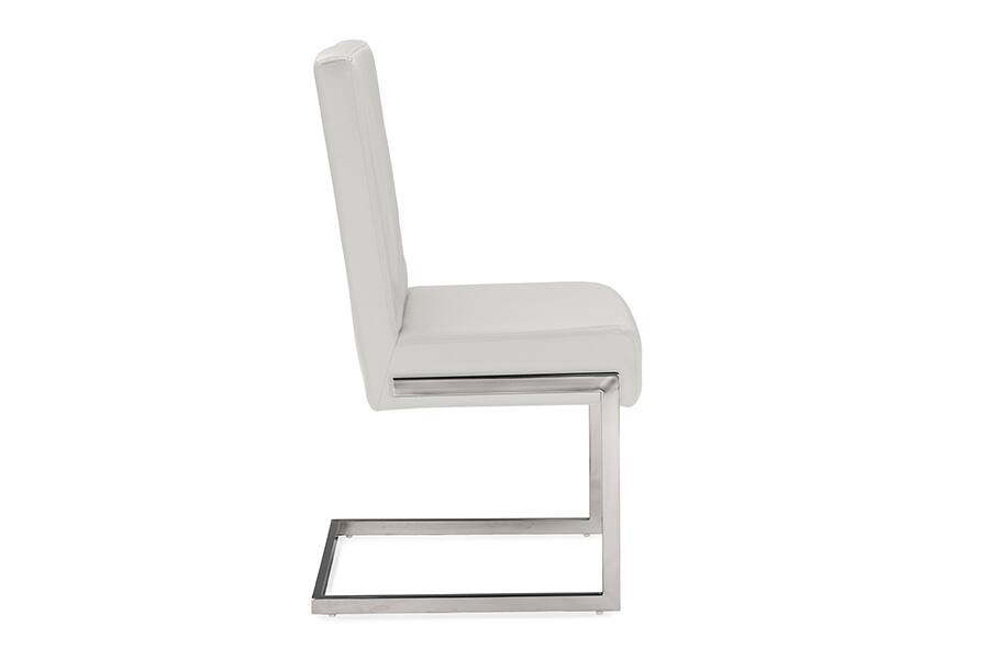Angle. Baxton Studio - Toulan Modern and Contemporary Faux Leather Upholstered Stainless Steel Dining Chair - White.