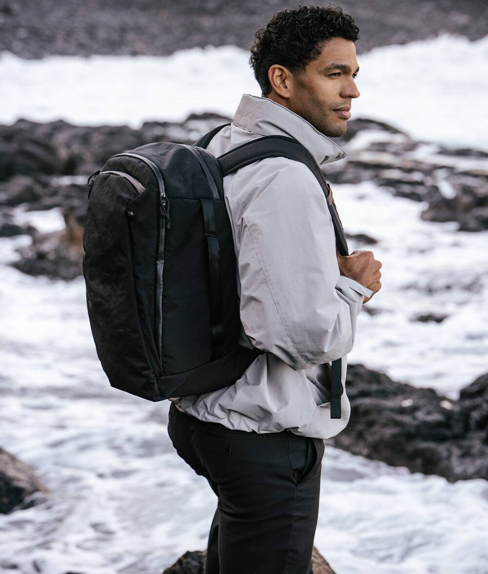 Angle. ALPAKA - Traverse 30L Travel Laptop Backpack for 16-Inch Laptops, Clamshell Opening, Luggage Pass-Through and Bottle Pocket - Black.