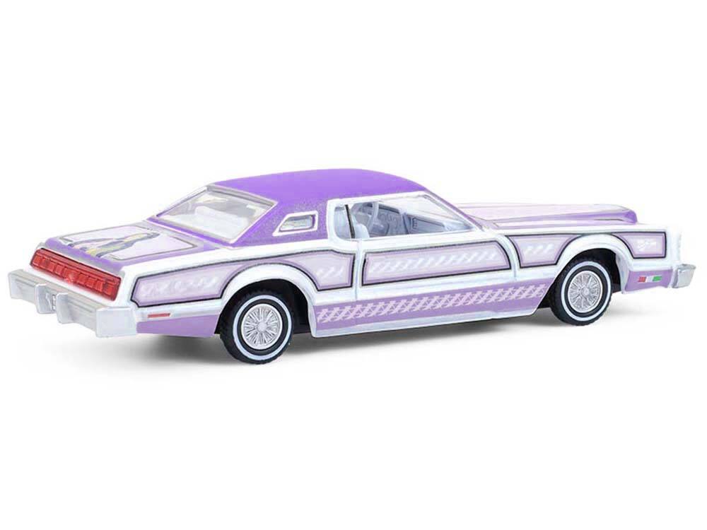 Alt View 2. Greenlight - 1973 Ford Thunderbird Lowrider Purple Metallic with Graphics and White Interior 1/64 Diecast Model Car by Greenlight.
