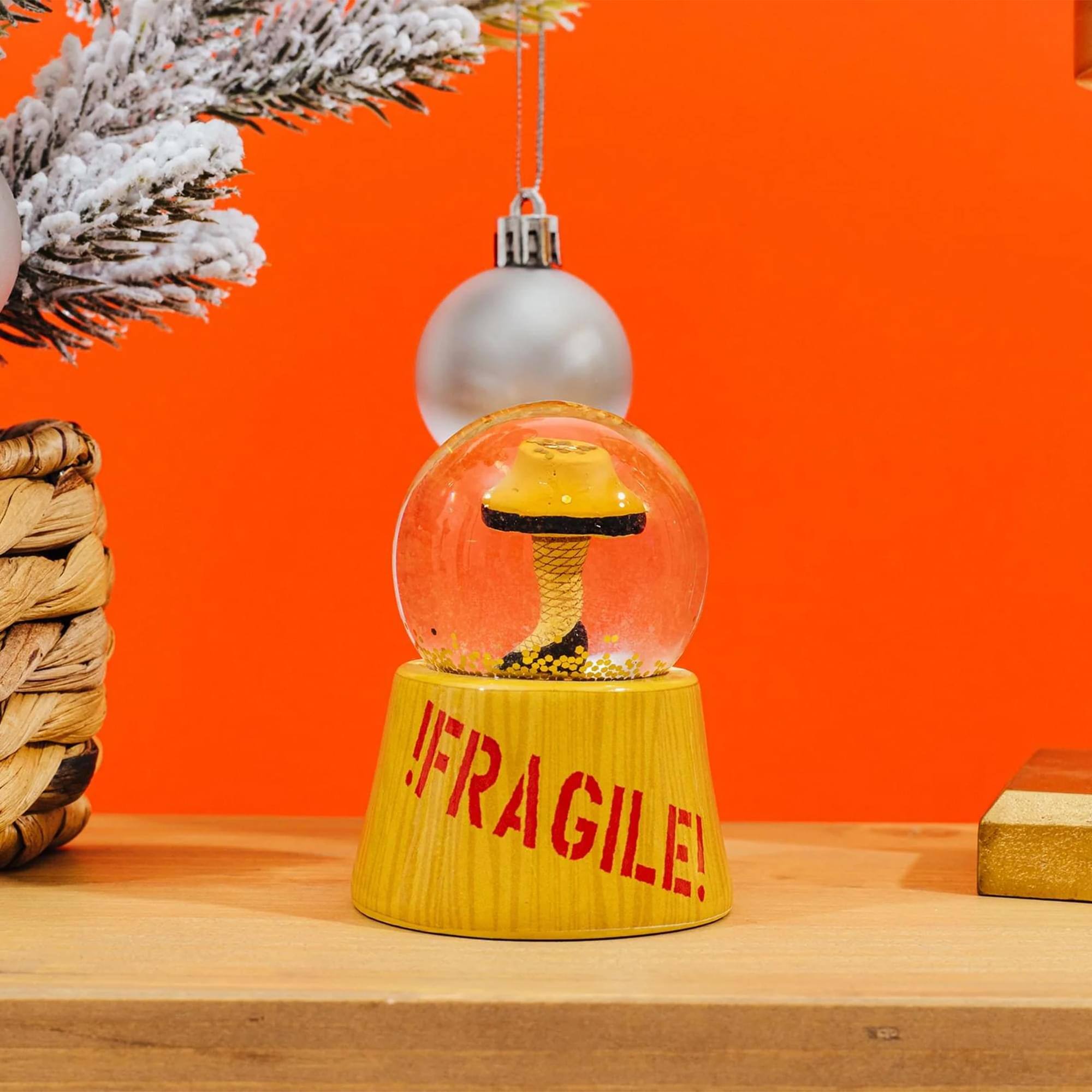 Alt View 5. Silver Buffalo - A Christmas Story Leg Lamp 3-Inch Mini and 6-Inch Large Light-Up Snow Globe Set - Brown.