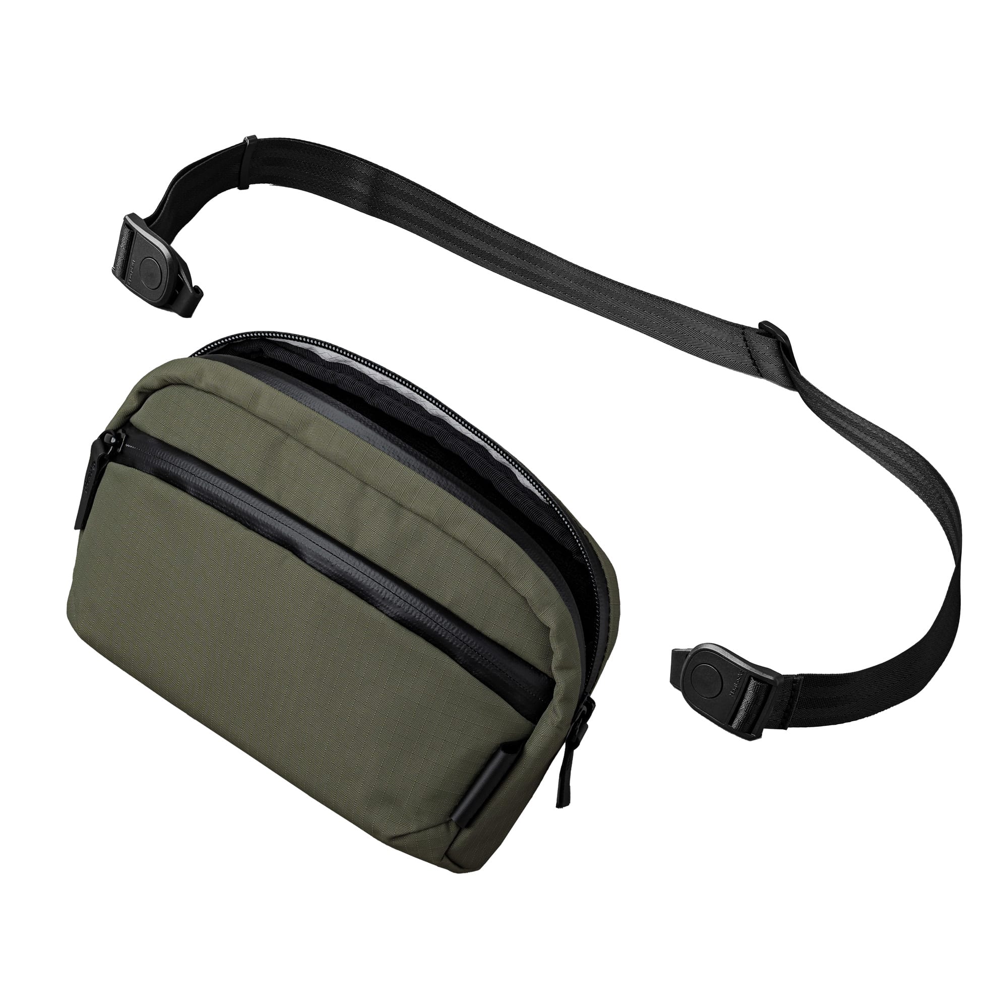 Front. ALPAKA - Flight Sling 1L Lightweight Crossbody Phone Bag for Travel, Passport Pocket, Weather-Resistant - Green Axoflux 210D.