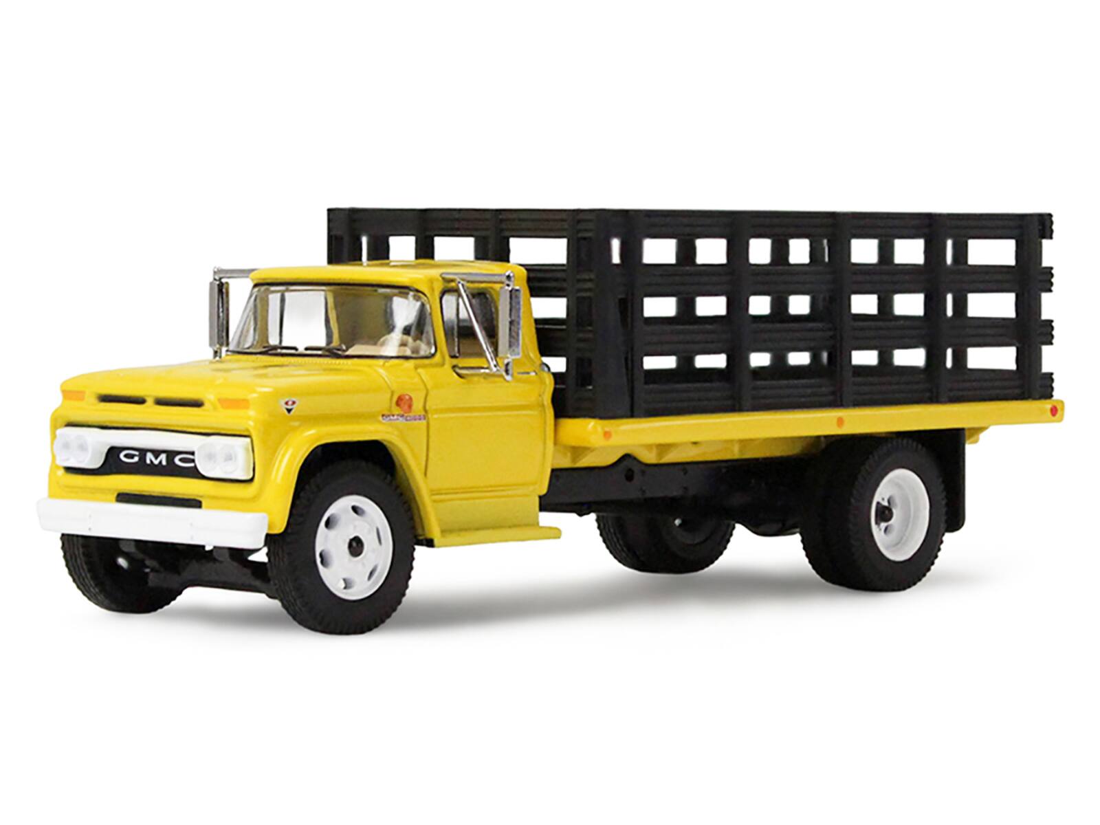Alt View 1. First Gear - GMC 4000 Stake Truck Bright Yellow 1/64 Diecast Model by DCP/First Gear.