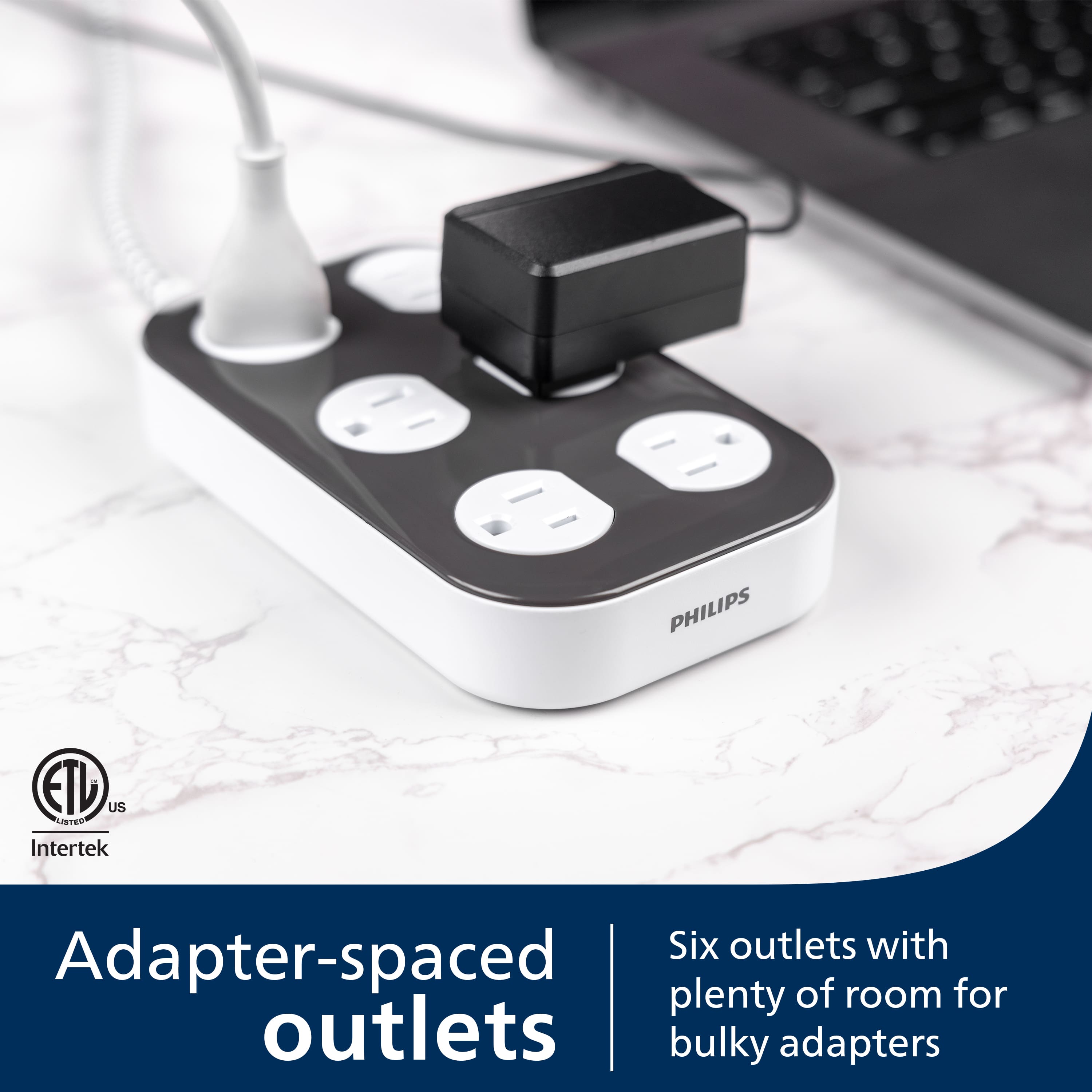 The text on the image reads: "Six outlets with plenty of room for bulky adapters."