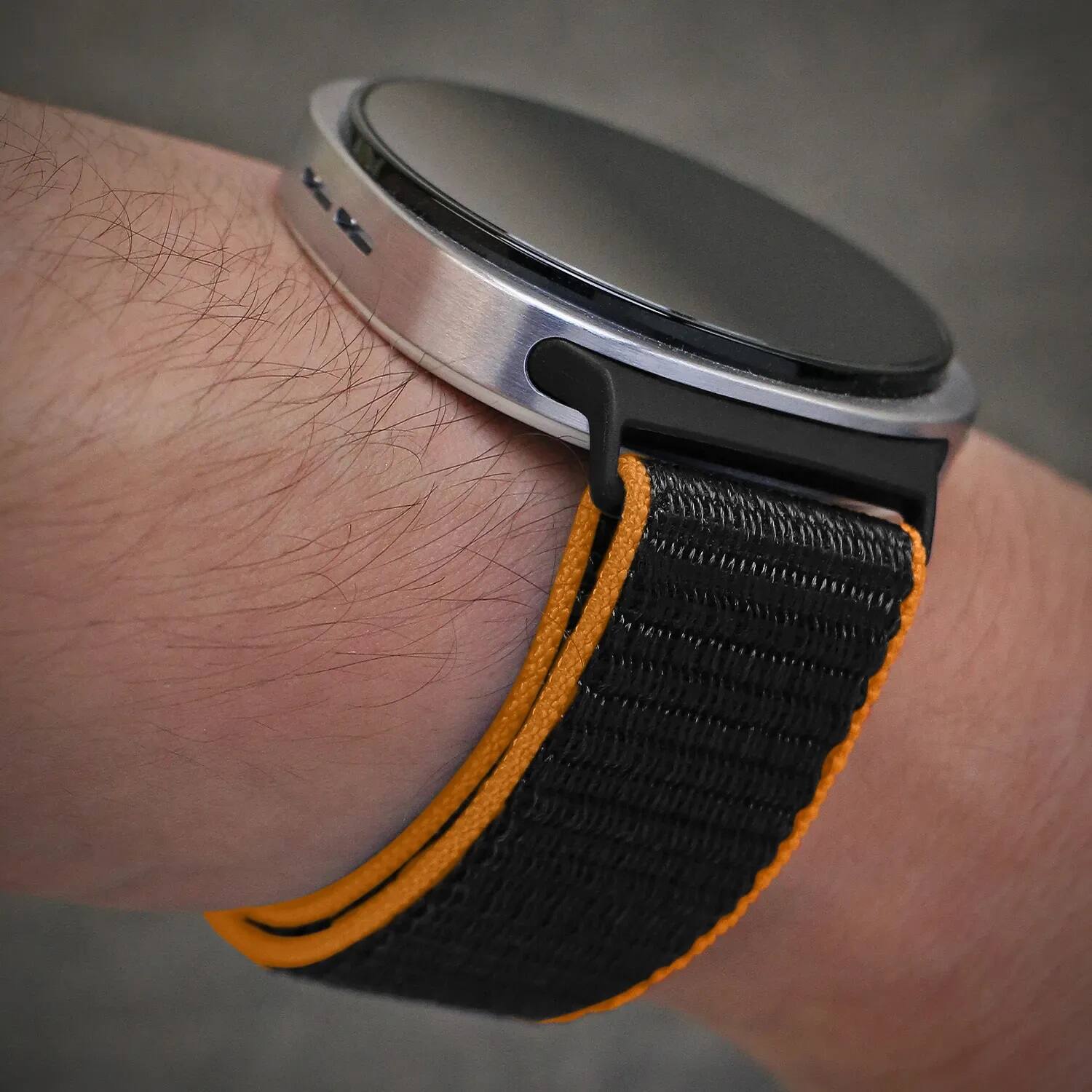 Left. StrapsCo - Nylon Comfort Watch Band Strap For Samsung Galaxy Watch 8 - Black & Orange.