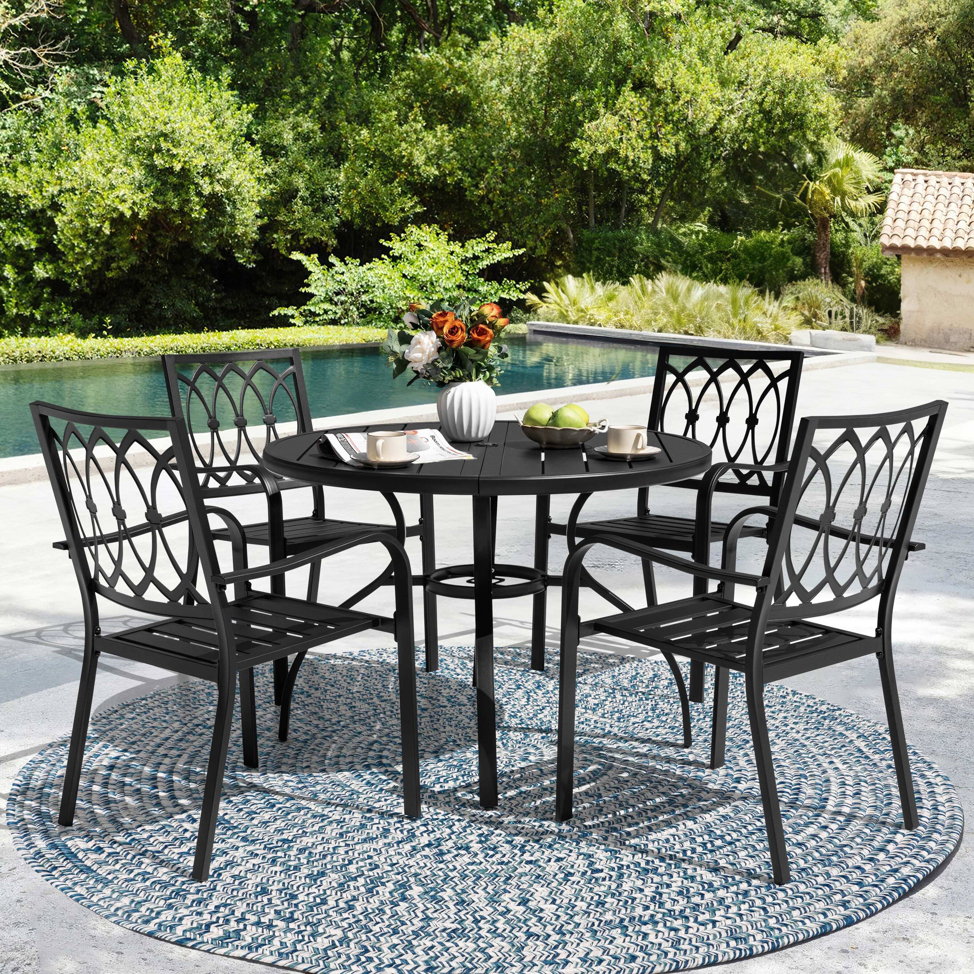 Angle. Nuu Garden - 5-Piece Metal Patio Dining Set with Umbrella Hole and 4 Stackable Chairs - Black.