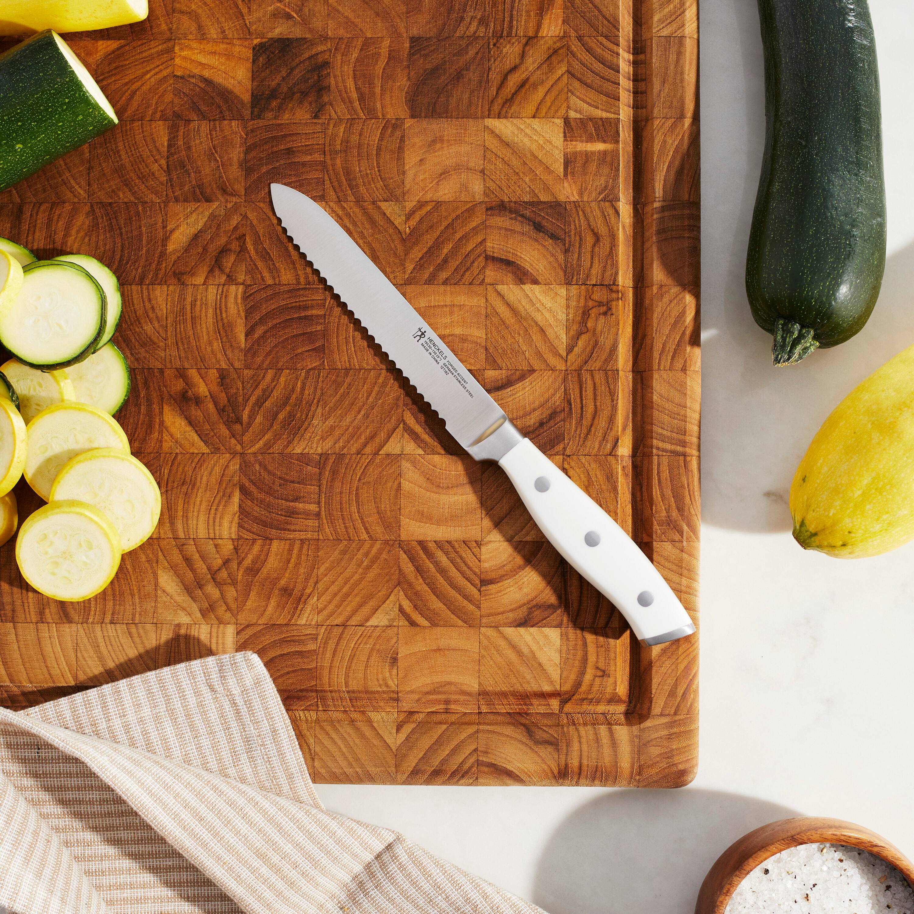 Alt View 1. Henckels - Henckels Forged Accent 5-inch Serrated Utility Knife - White Handle - Stainless Steel.