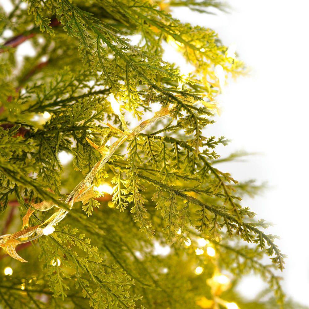 Angle. Resenkos - 6ft Pre-Lit Artificial Christmas Tree, Hinged Branches for Easy Setup with 612 Tips and LED Lights, Green - Green.