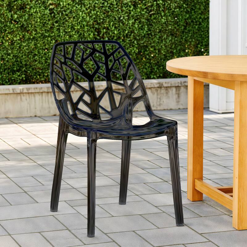 Angle. LeisureMod - Cornelia Modern Stackable Accent Dining Chair with Cut Out Backrest Design for Dining Rooms or Patios - Transparent Black.