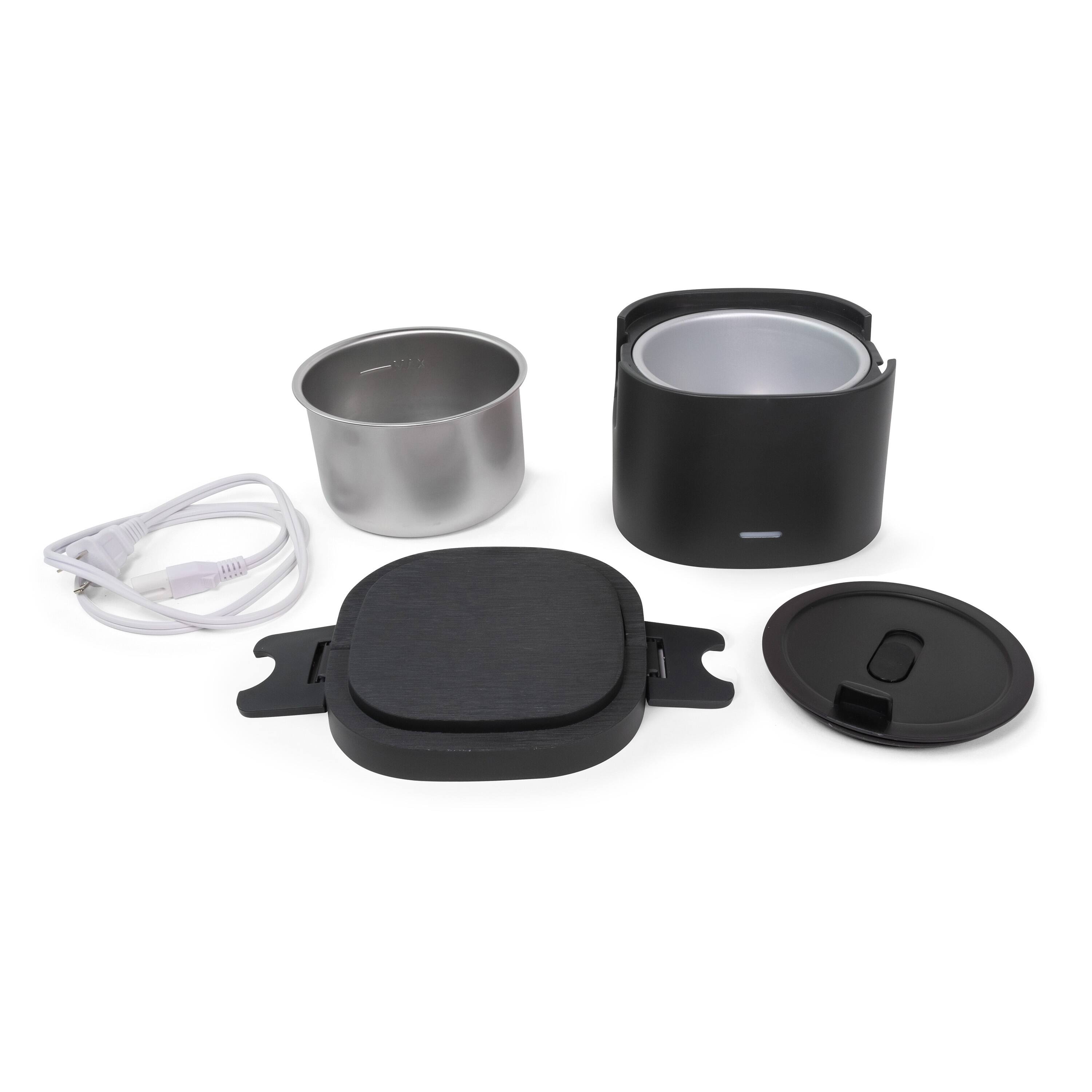 The image shows a set of items that appear to be components of a portable coffee or tea brewing kit. Here is a description of the items:

1. A black, rectangular, textured base with a handle on one side.
2. A black cylindrical container with a lid.
3. A silver cylindrical container.
4. A white USB cable with a USB connector on one end.
5. A black lid with a handle.

These items are likely used together to brew coffee or tea on the go.