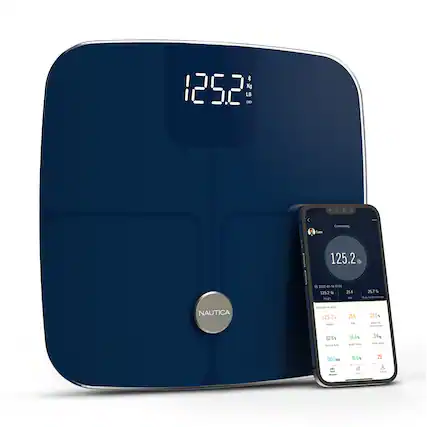 The image shows a blue scale with a cell phone next to it. The scale displays the weight of 125.2 kg or 275.7 lbs. The cell phone is connected to the scale, possibly for tracking weight changes or monitoring fitness goals. The scene suggests that the person using the scale is taking a picture of the device, possibly to share their progress or achievements with others.
