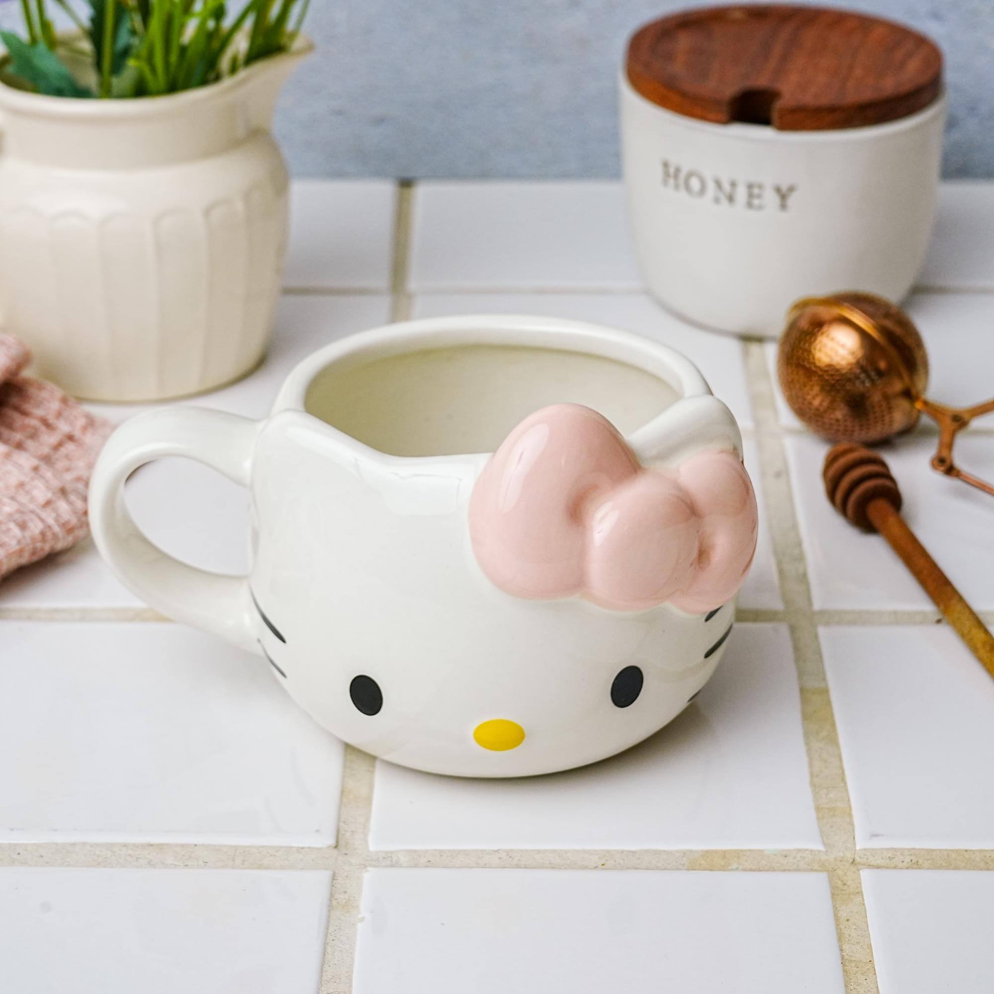 Alt View 3. Silver Buffalo - Sanrio Hello Kitty Face Pink Bow Sculpted Ceramic Mug | Holds 20 Ounces - Multi-Colored.