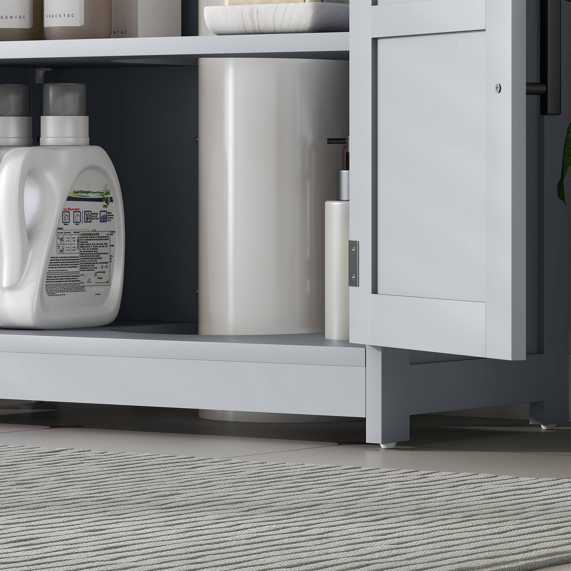 The text in the image appears to be a mix of product labels and possibly some handwritten notes. Here is the corrected and grouped text:

**Product Labels:**
1. **LiquiDetergent**
   - Liquid Detergent
   - 2.5 kg
   - (Additional text is too small to read clearly)

2. **GENETOC**
   - (Repeated multiple times on boxes in the background)

**Handwritten Notes:**
- GENISS HOERTOC NESL
- nothing_to_t
- 14: et
- I e : I - - I I e - : I I . - - 

The handwritten notes seem to be a mix of letters and numbers, possibly a code or a list, but they are not clear enough to decipher accurately.