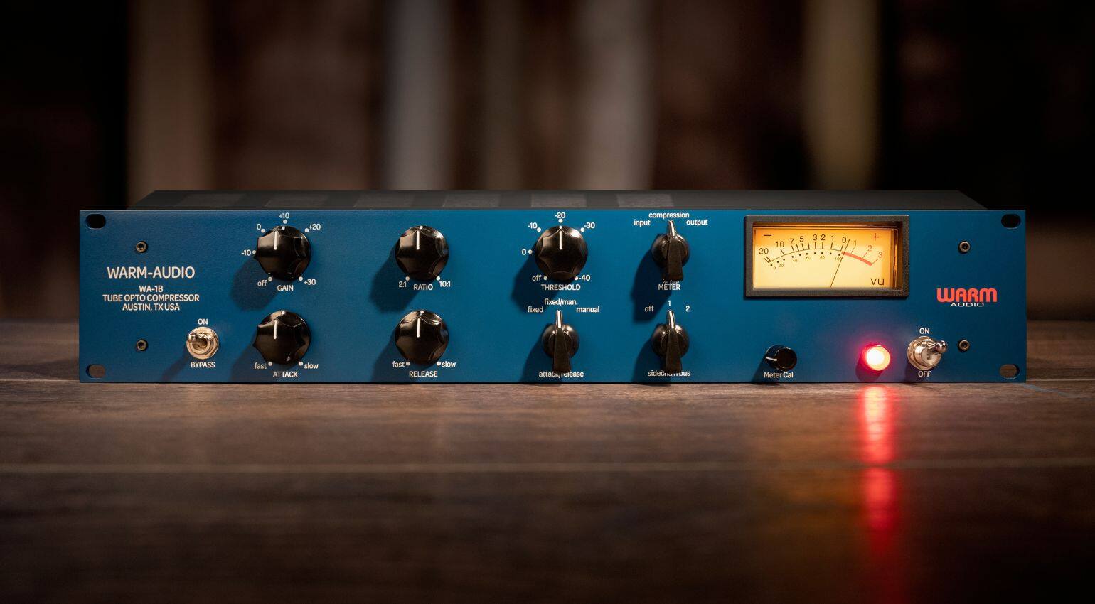 WARM-AUDIO WA-1B TUBE OPTICAL COMPRESSOR  
AUSTIN, TX, USA  

ON -10 a off +10  
GAIN 20 30 21 10:1  
RATIO 20 10 30 0 off 40  
THRESHOLD fixed/man. fixed manual  
compression input output  
TER 1 off 2 I 10 20 I M 2e 5 3 2 7 - - . 1 0 ! -m 1 + 2 3 vu  
WARM AUDID ON BYPASS  
fast slow ATTACK fast slow RELEASE  
attac Xayease sideo Meter Cal OFF