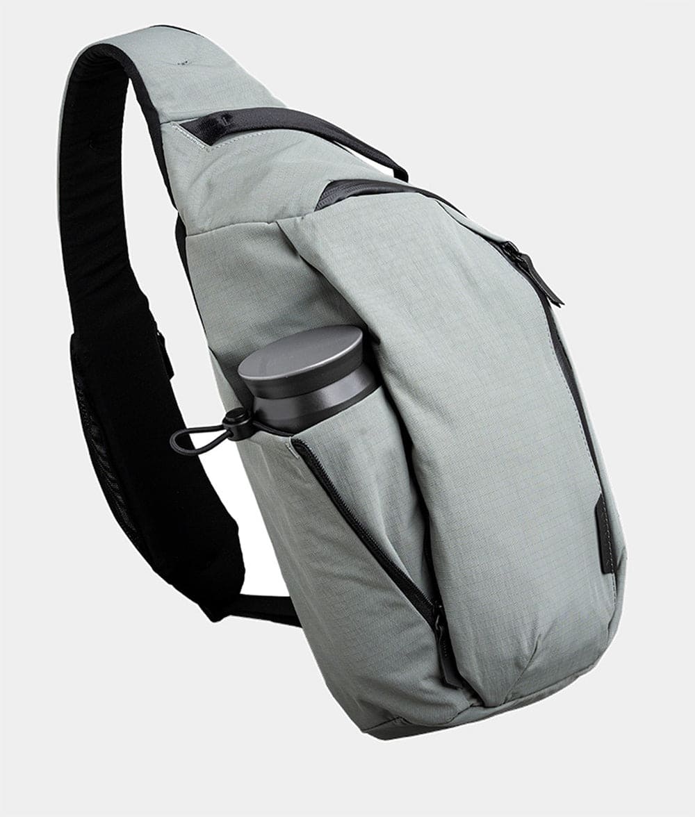 ALPAKA - Crossbody Sling Bag 7.5L (Left Shoulder) for Men, Fits 11" Tablet, Phone Sleeve, Bottle Pocket, Luggage Pass-Through - Grey Axoflux 210D