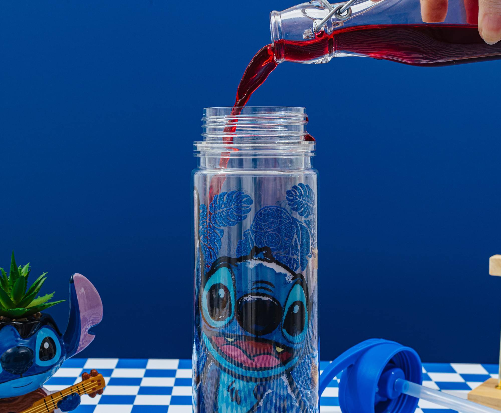 Alt View 5. Silver Buffalo - Disney Lilo & Stitch Floral Glitter Plastic Water Bottle | Holds 18 Ounces - Multi-Colored.