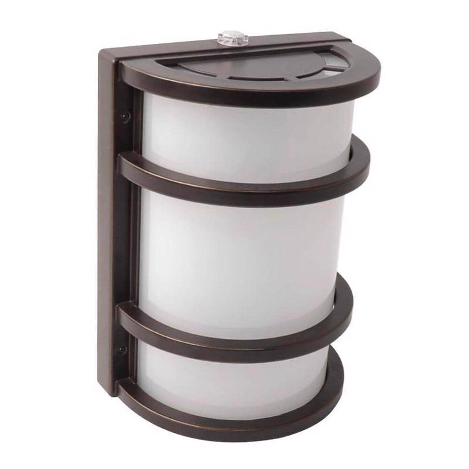 Left. FEIT ELECTRIC - Feit LED Dusk to Dawn Hardwired LED Bronze Security Wall Light.