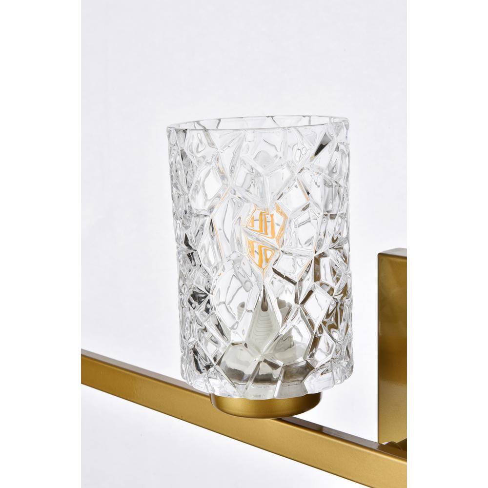 Left. Living District - Cassie 4 lights bath sconce in brass with clear shade - Brass And Clear Shade.