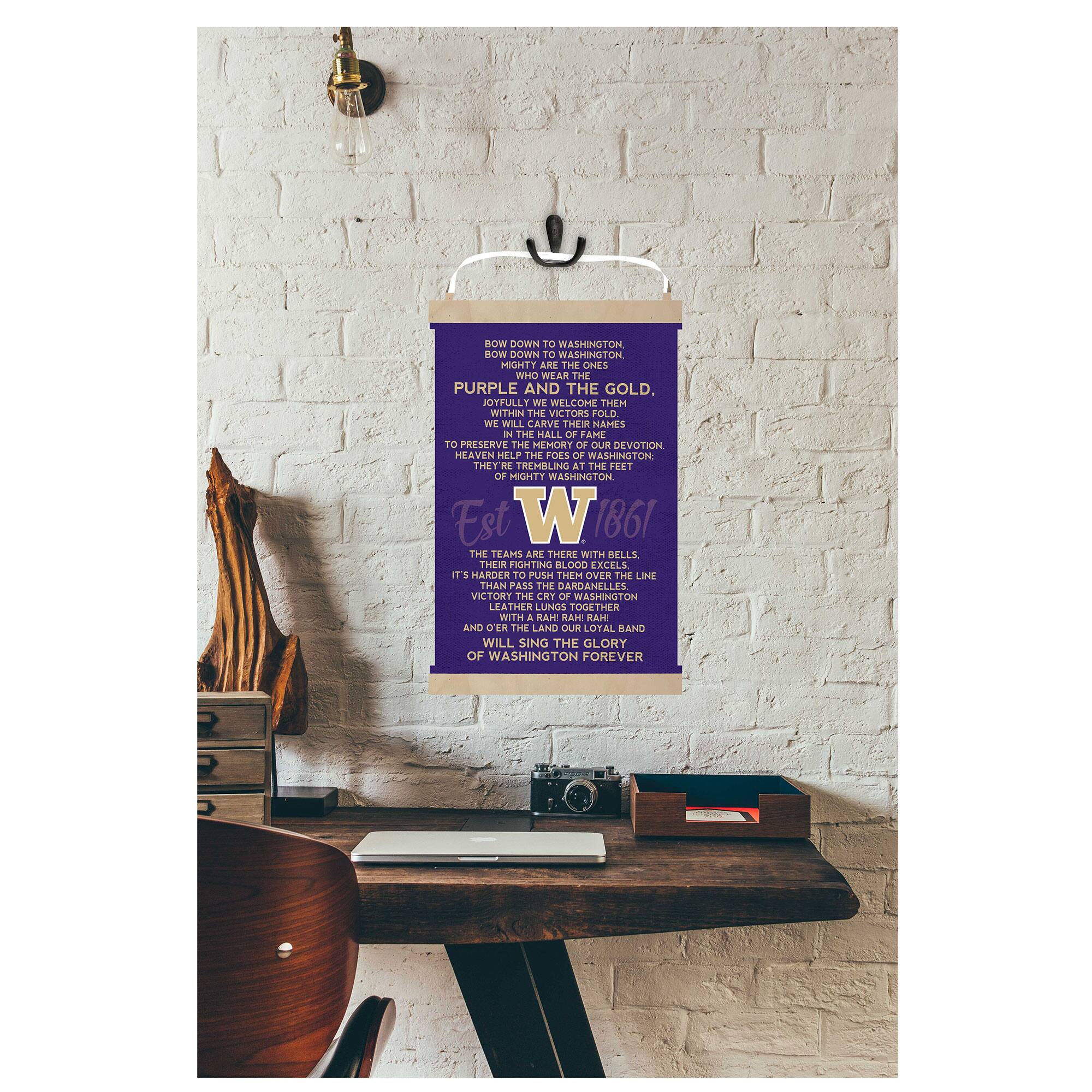 BOW DOWN TO WASHINGTON  
HOW DOWN TO WASHINGTON  
MIGHTY ARE THE ONES WHO WEAR THE PURPLE AND THE GOLD.  
JOYFULLY WE WELCOME THEM WITHIN THE VICTORS FOLD  
WE WILL CARVE THE NAMES ON THE WALL OF FAME TO PRESERVE THE MEMORY OF OUR DEVOTION  
HEAVEN HELP THE FORS OF WASHINGTON THAT TREMBLE AT THE FEET OF MIGHTY WASHINGTON  

Est W 1861  

THE TEAMS ARE THERE WITH BELLS.  
IT'S HARDER TO PUSH THEM OVER THE LINE THAN PASS THE DARDAHELLES.  
VICTORY THE RIGHT OF WASHINGTON  
LEATHER LUNGS TOGETHER WITH A RAIN HAR AND OVER THE LAND  
OUR LOYAL BAND WILL SING THE GLORY OF WASHINGTON FOREVER