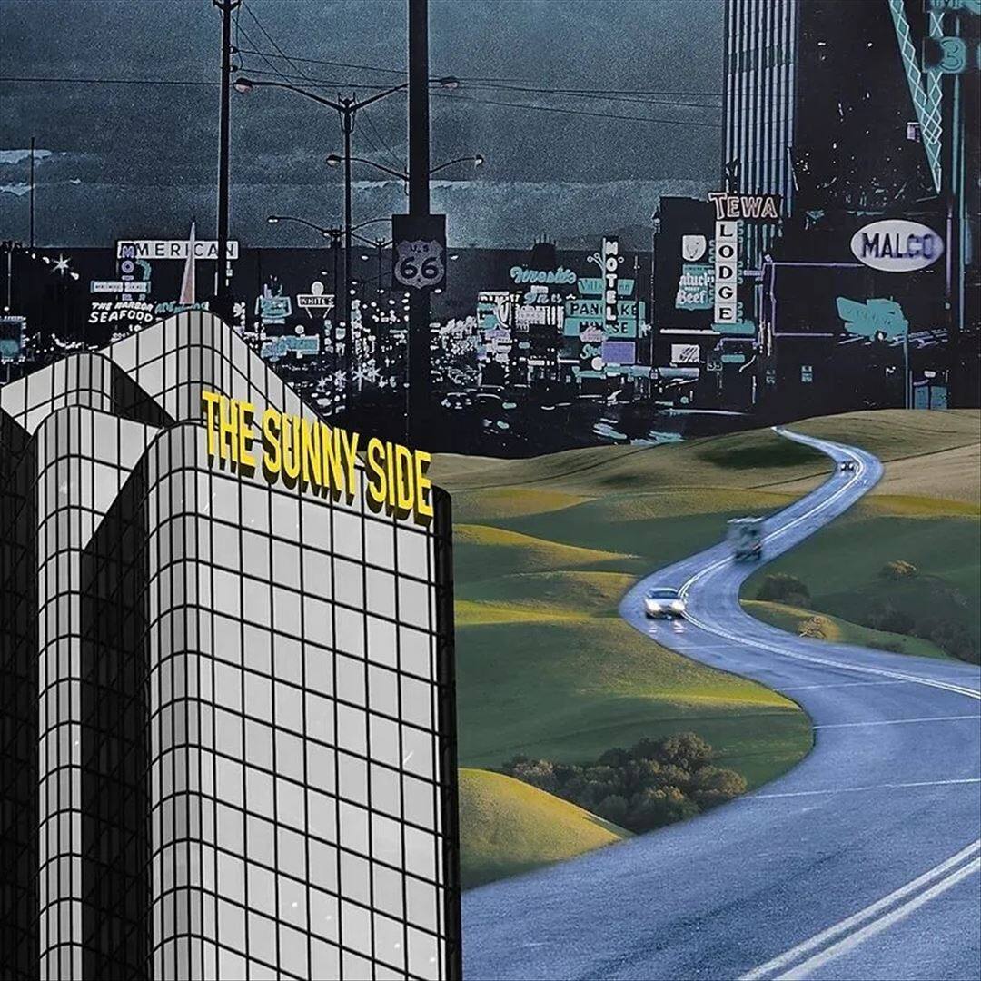 The Sunny Side is a hotel located in Las Vegas, Nevada. The hotel is situated on the side of a road, and it is a prominent feature in the image. The Sunny Side is a tall building, and it stands out against the backdrop of the city. The hotel is likely a popular destination for tourists and visitors to the city, given its prominent location and unique design.