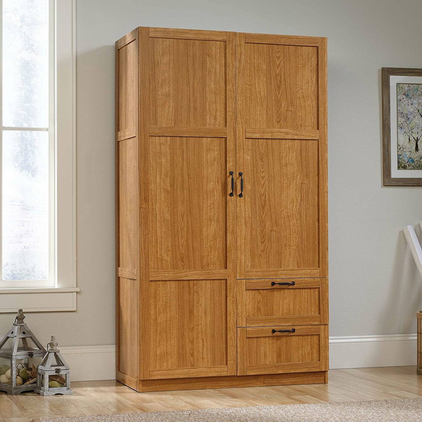 Angle. SlickBlue - Freestanding Closet Organizer with Doors and Shelves for Bedroom Storage - Medium Oak.