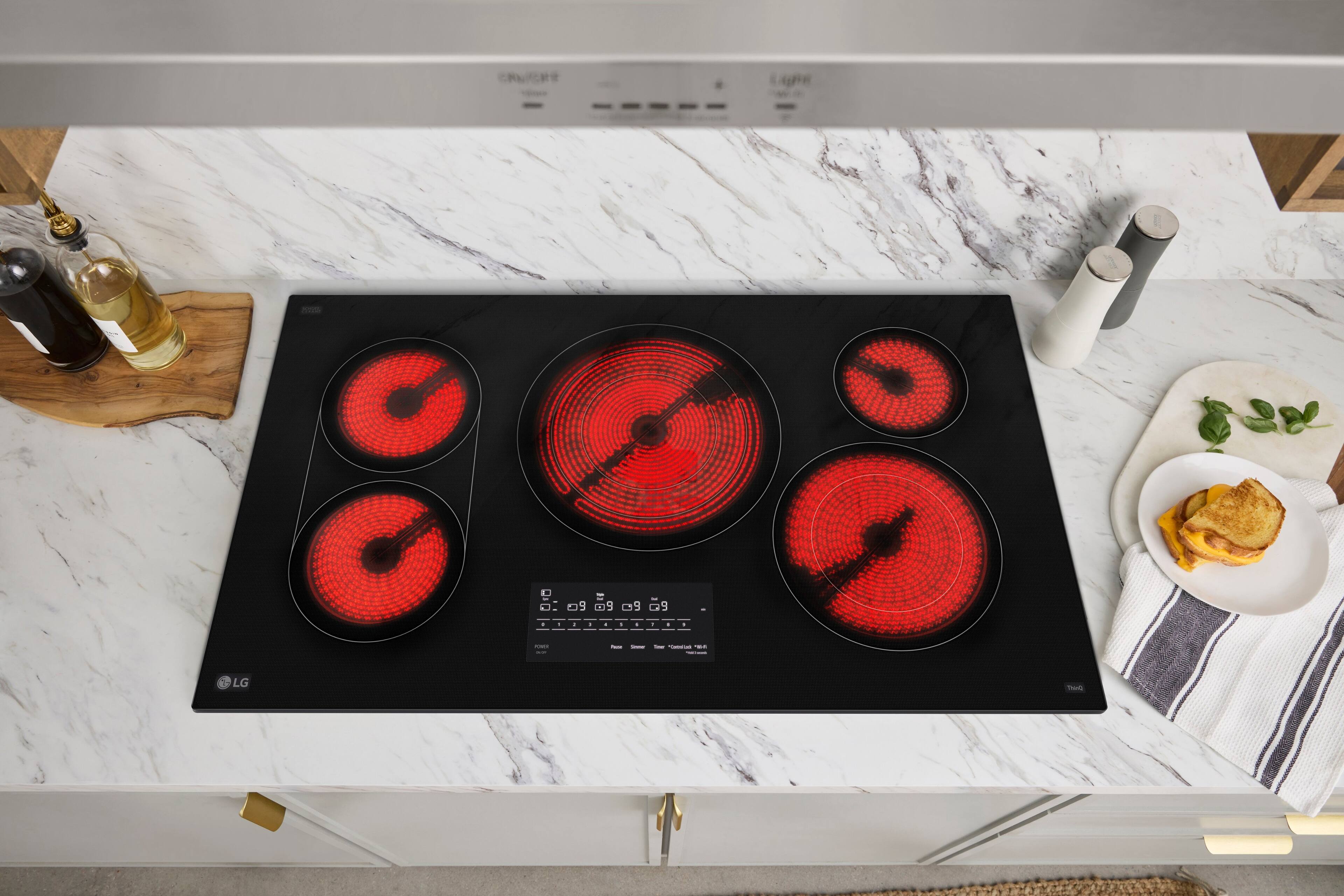 Alt View 12. LG - 36" Built-In Electric Smart Cooktop with 5 Elements, Backlit SmoothTouch Glass Controls and 3.6kW Triple Element - Black.