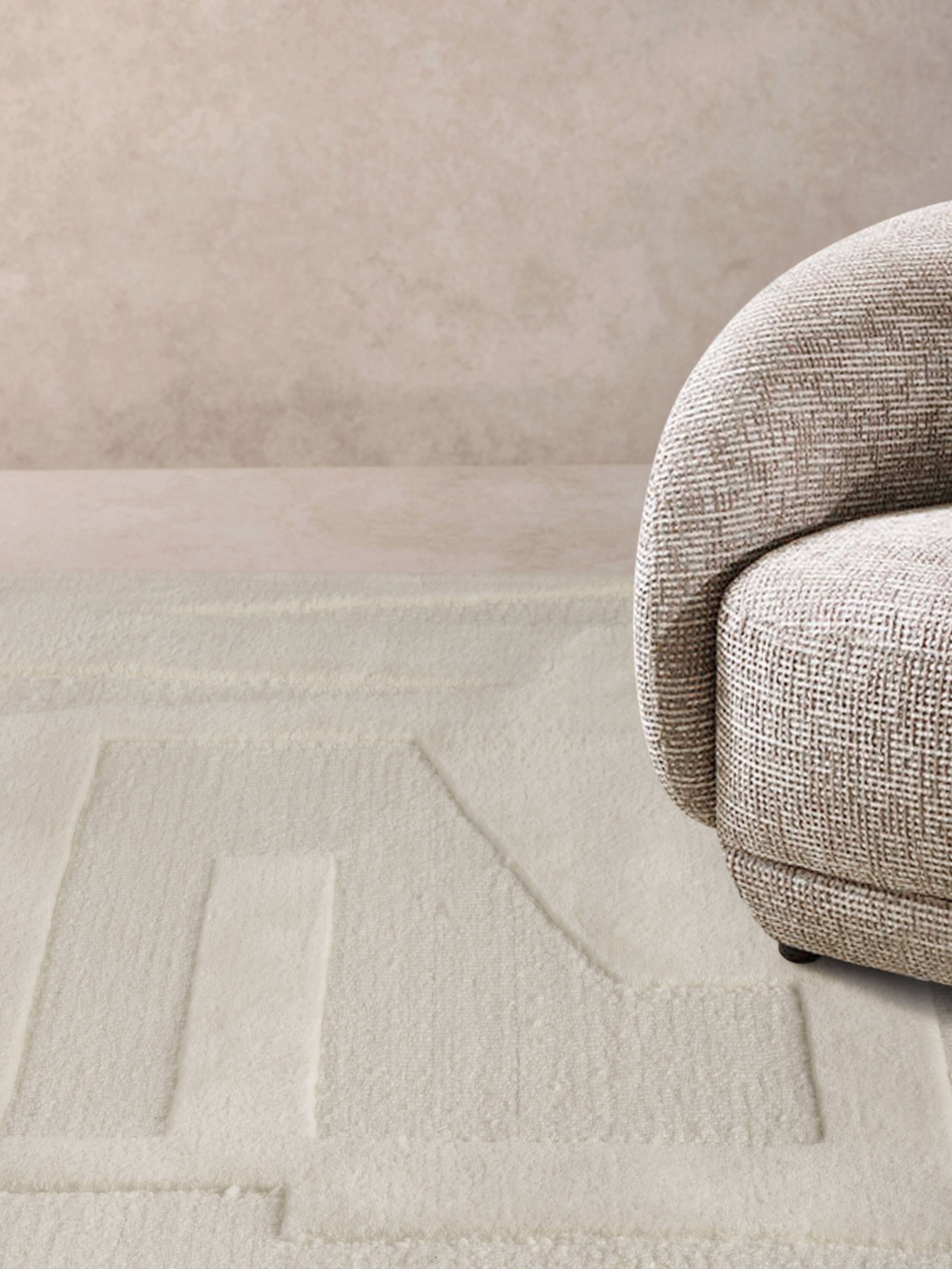 Angle. GAURI KOHLI - Furano Rug - Shades of ivory.