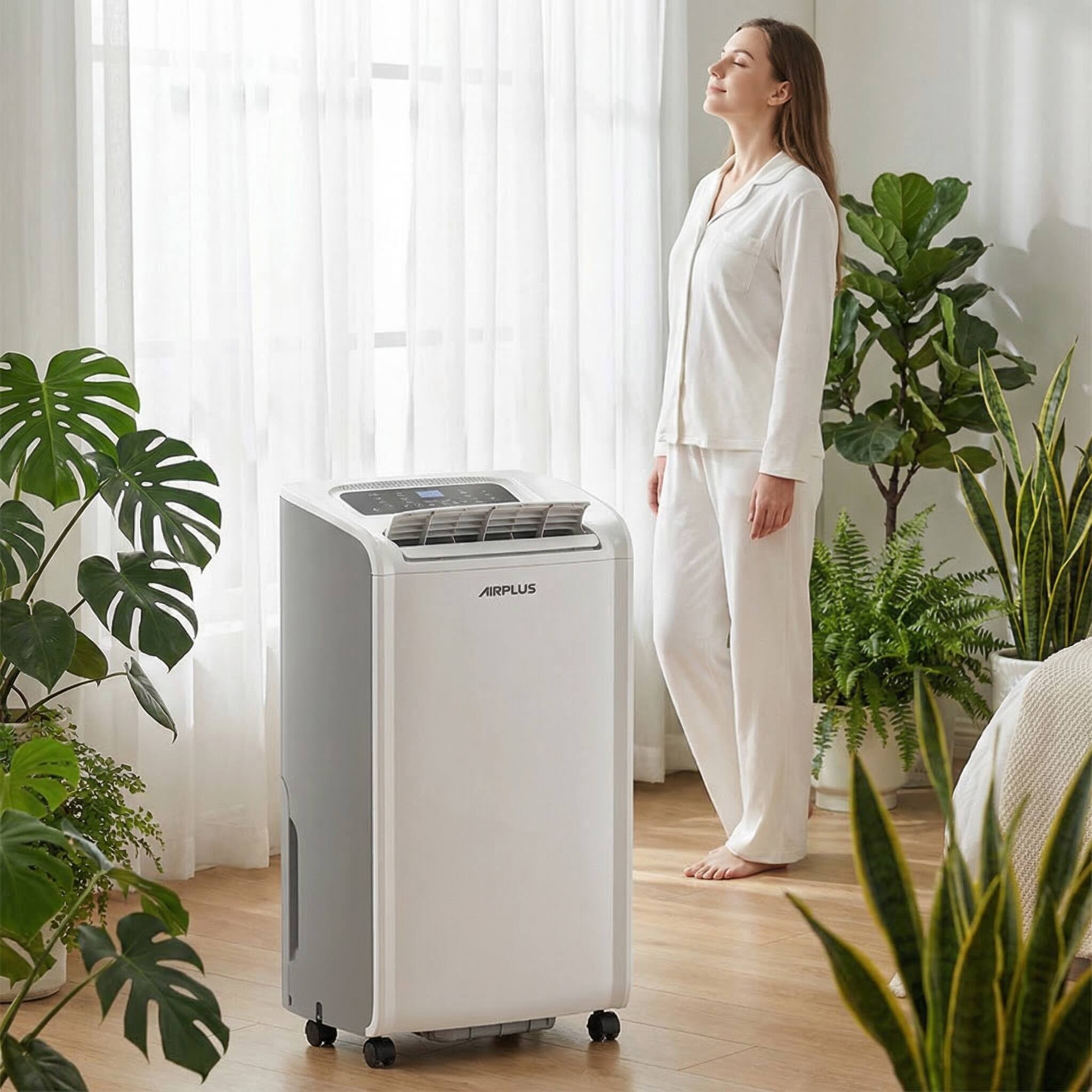 Back. Airplus - 4500 Sq. Ft 47 Pints Portable Dehumidifier with Drain Hose for Basement.