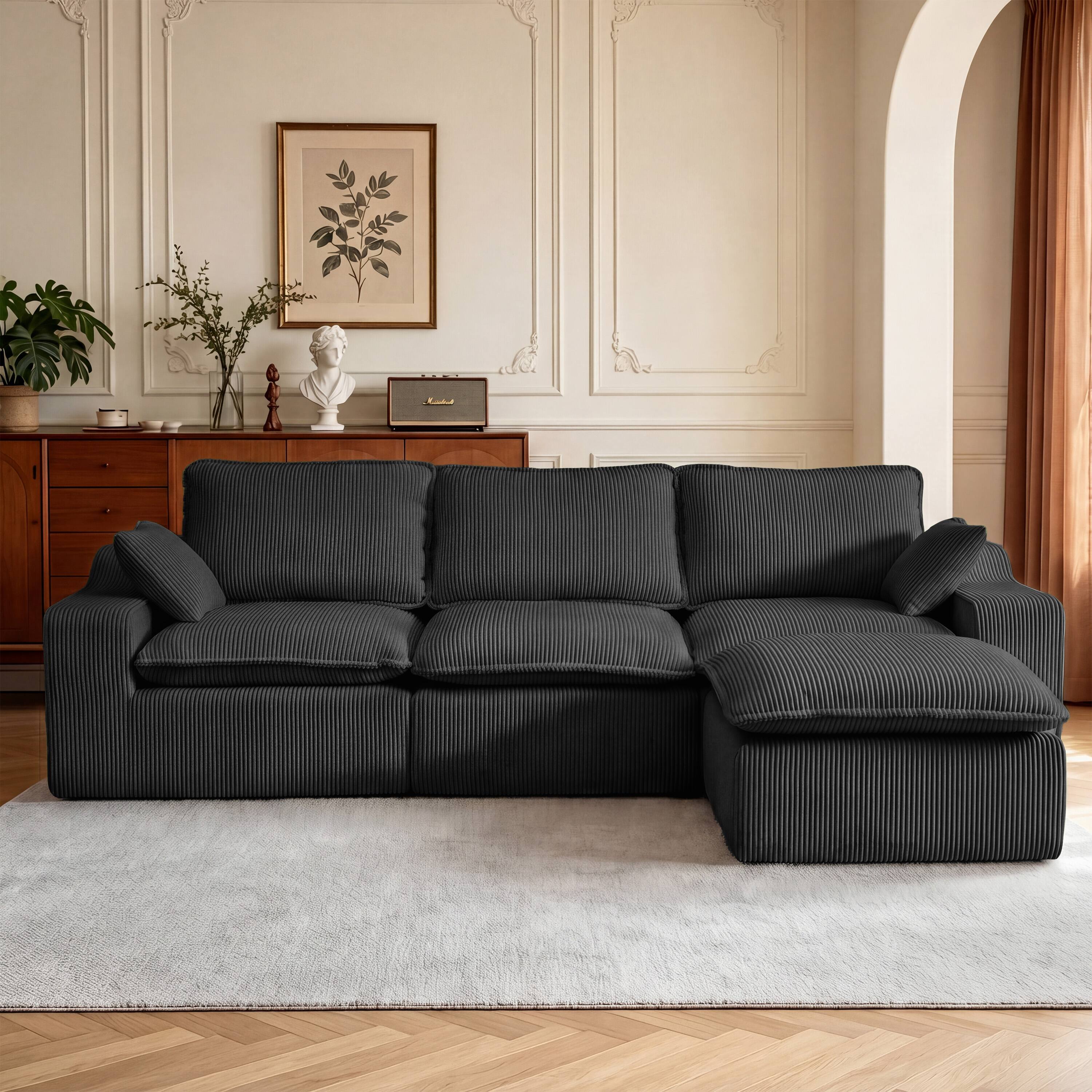 Angle. CarterChairr - 107" L-Shape Modular Sectional Sofa with Ottoman & 2 Pillows, Cloud Boneless Couch for Living Room - Black.