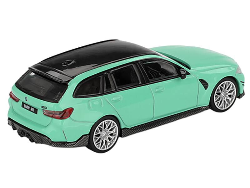 Left. Mini GT - BMW M3 M Performance Touring Mint Green with Black Top Limited Edition 1/64 Diecast Model Car by Mini GT - Mint Green with Black.