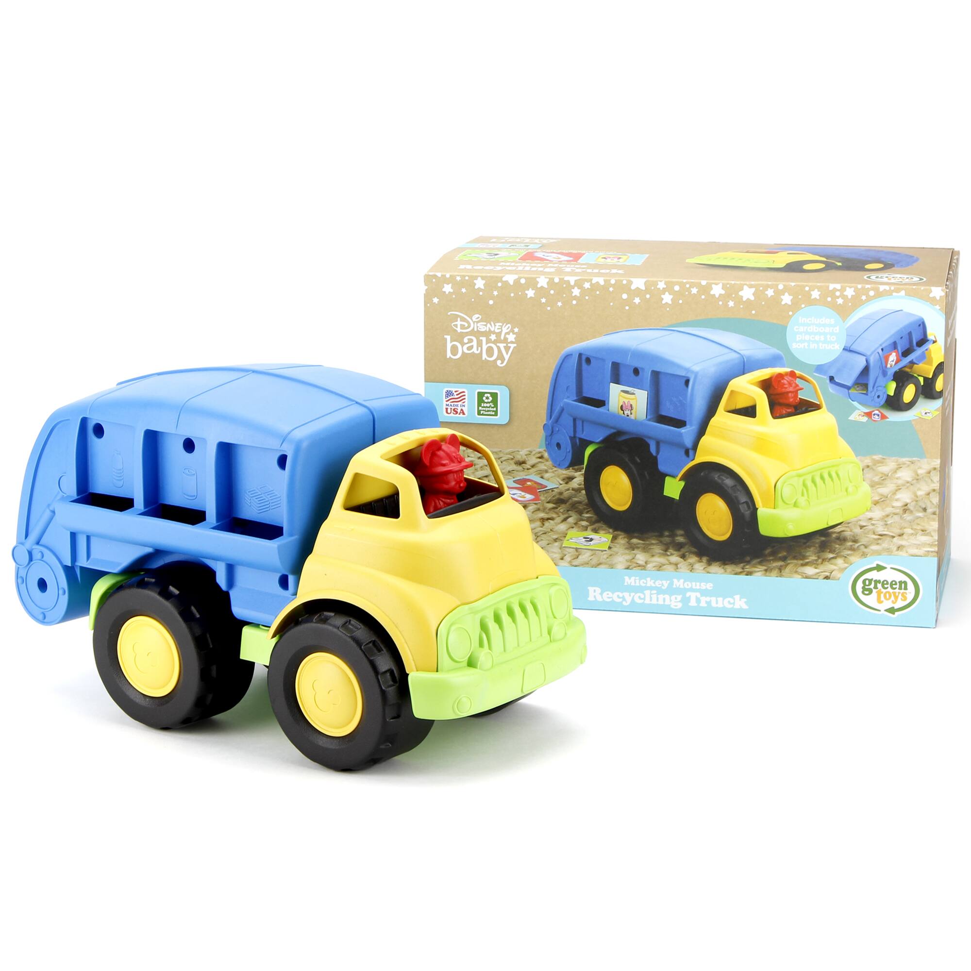 The image features a blue and yellow toy truck, which is part of a Disney Baby toy set. The toy set includes cardboard pieces to build a recycling truck and is made in the USA. The toy truck is designed to be environmentally friendly and promotes recycling.