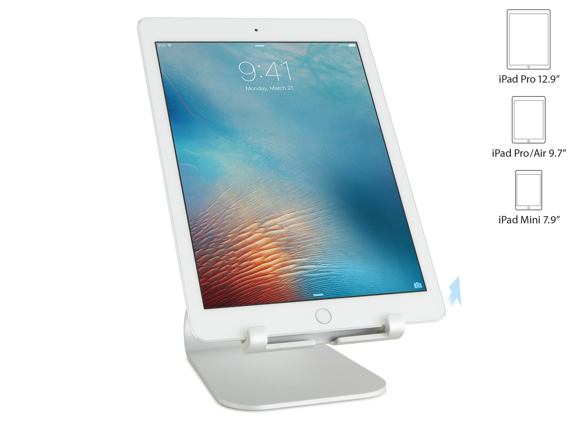 The image shows a white iPad Pro with a 12.9" screen, which is placed on a stand. The stand is designed to hold the iPad at an optimal viewing angle, making it easier to read or watch content on the screen. The stand is also compatible with other iPad models, including the iPad Pro/Air 9.7" and the iPad Mini 7.9".