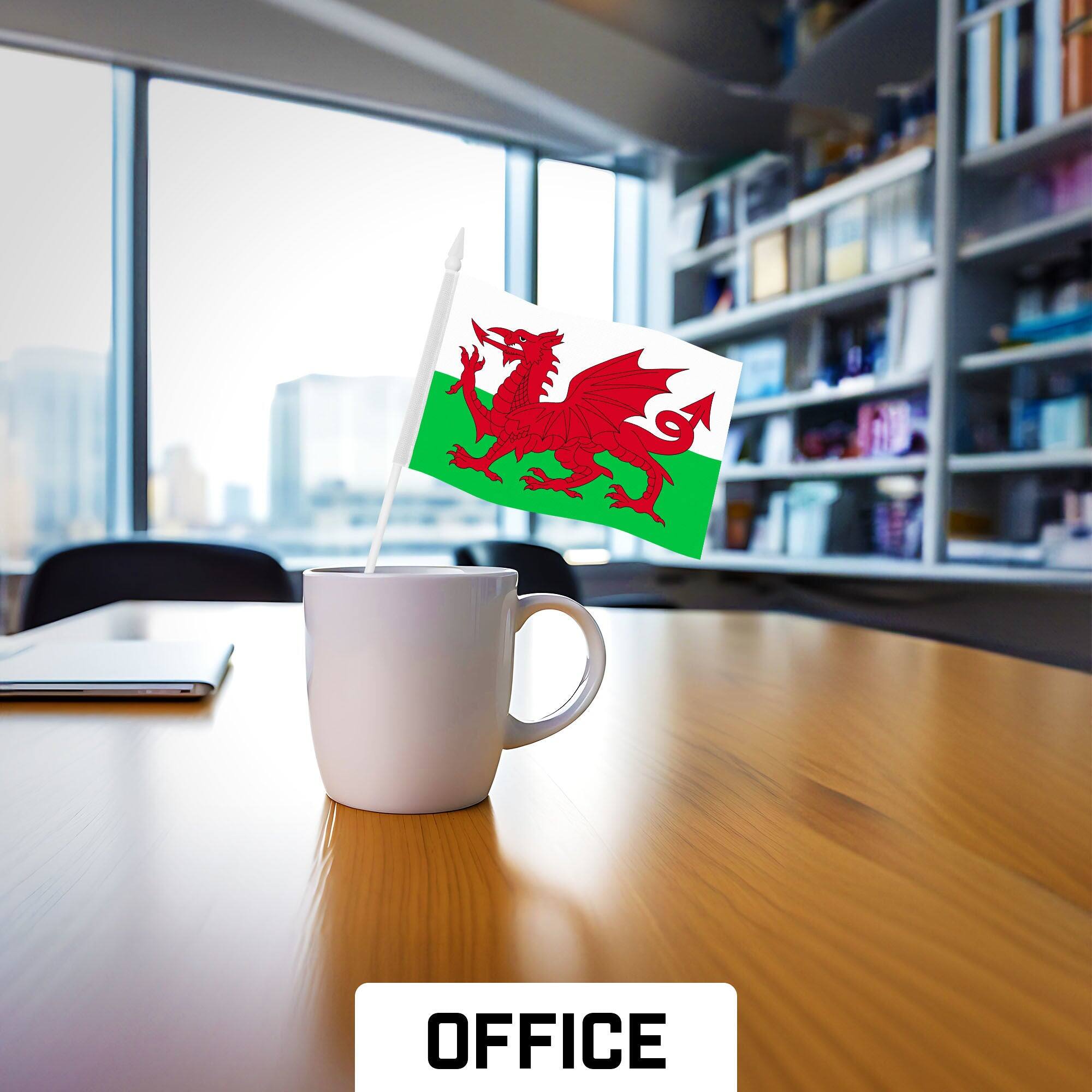 Left. G128 - 30-Pack Wales Handheld Stick Flags — 4 x 6 in, 150D Polyester, Plastic Pole. - Assorted Colors.