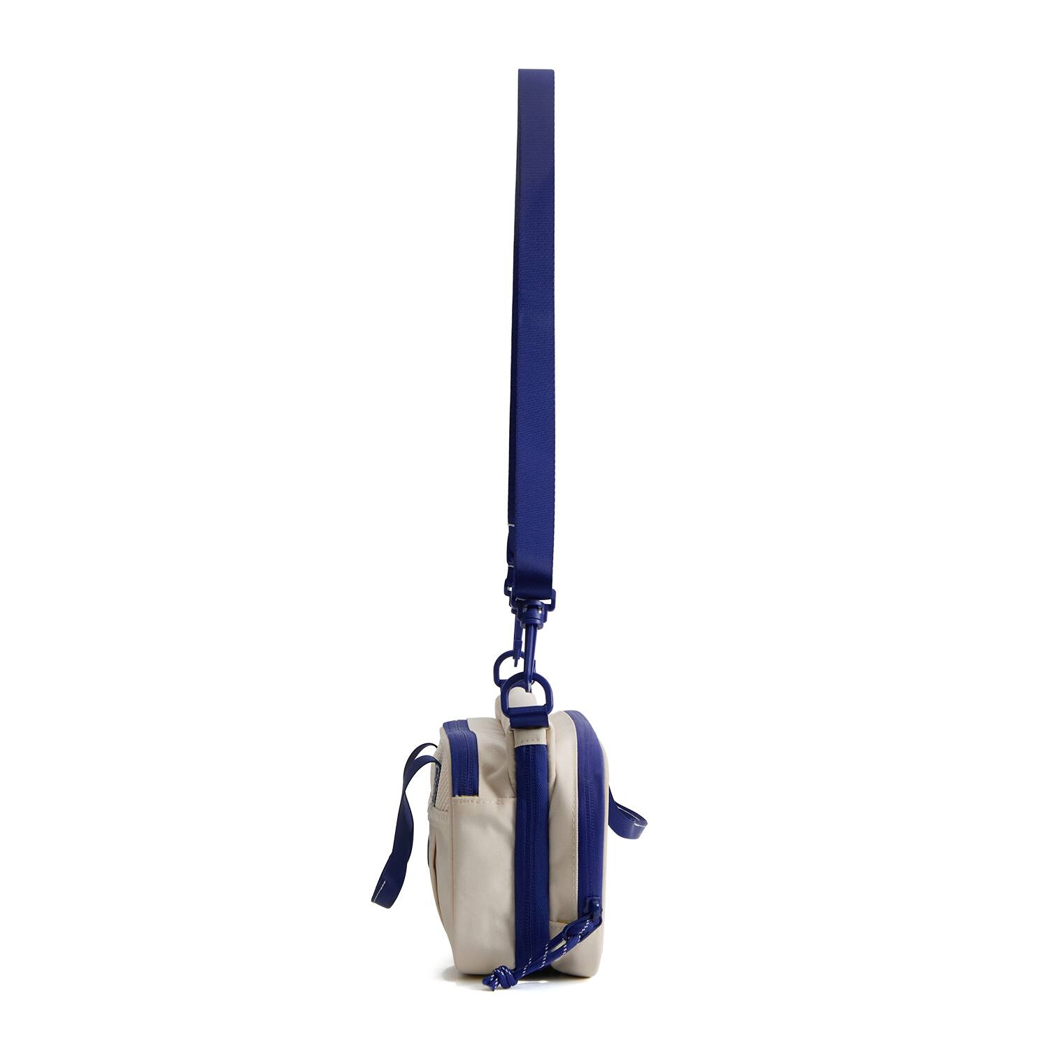 Left. Bagsmart - Coast Water Bottle Sling Bag, Water-Repellent Crossbody with Dry-Wet Separation for Beach & Daily Use - Ivory.