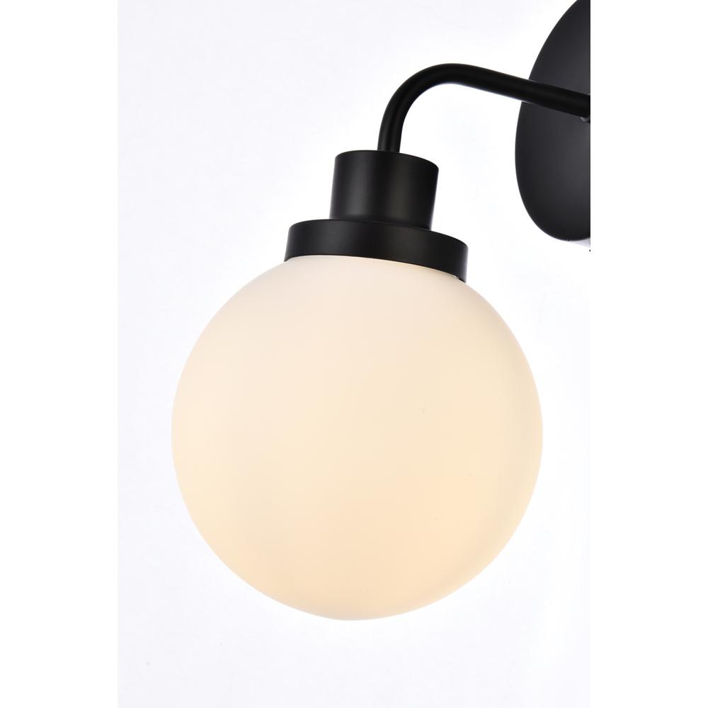 Alt View 1. Living District - Hanson 1 light bath sconce in black with frosted shade - Black And Frosted Shade.