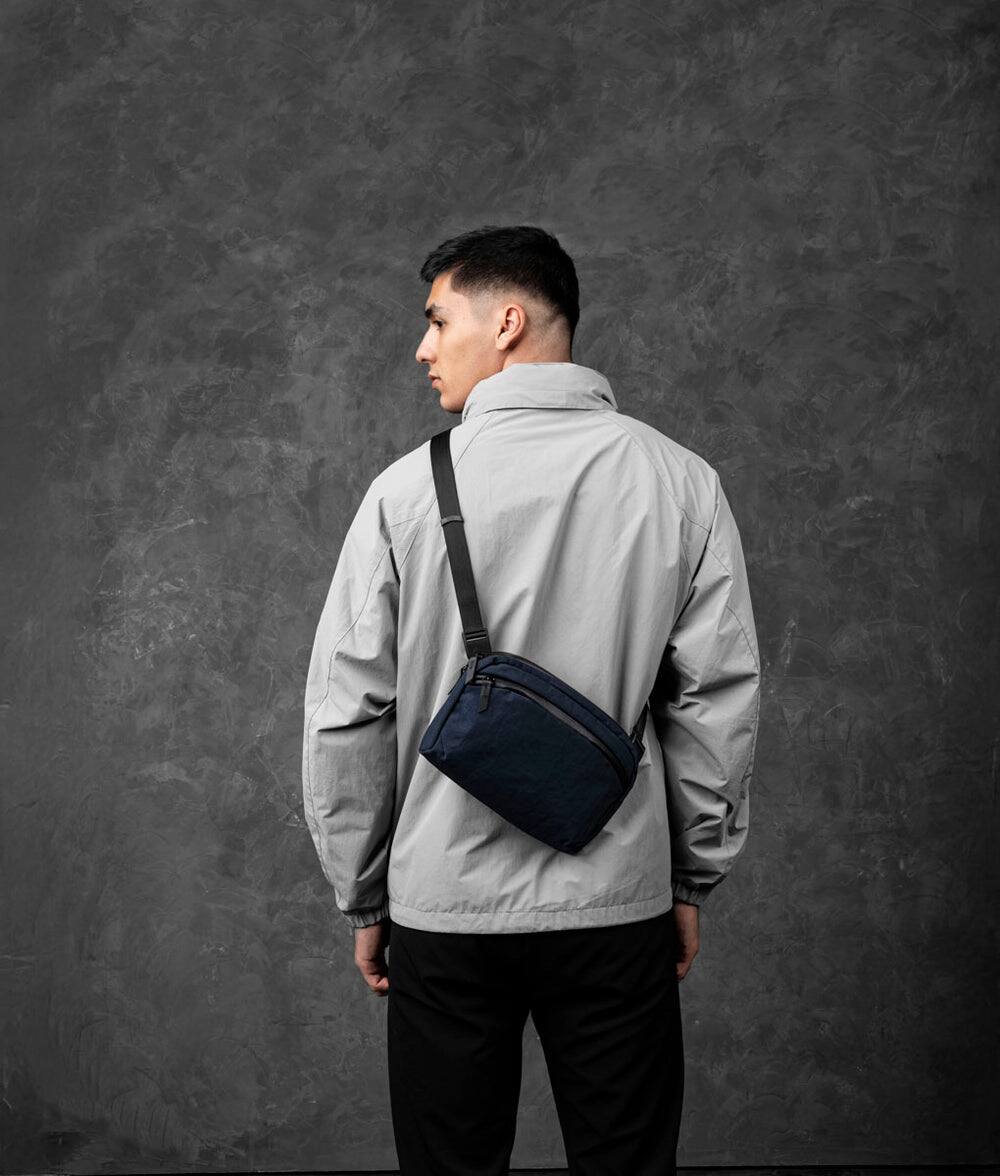 Left. ALPAKA - ALPAKA Flight Sling 2L Lightweight Packable Travel Sling Bag with Tablet Sleeve and Detachable Strap - Moonlight Blue/Grey Axoflux 400D.