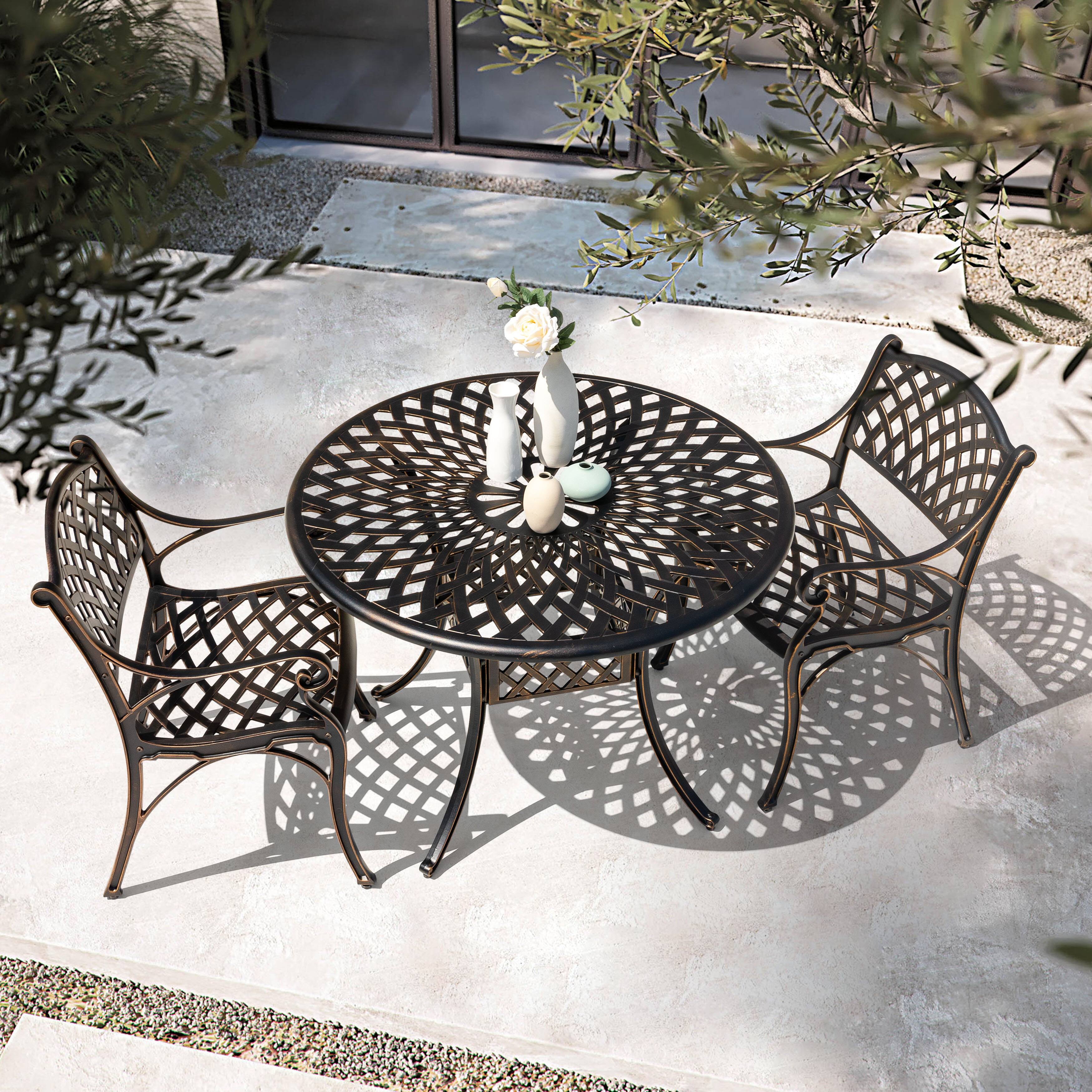 Left. Nuu Garden - Outdoor 2-Piece Patio Cast Aluminum Dining Chairs with Armrests - Black with Gold-Painted Edges.