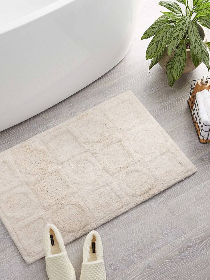 Left. GAURI KOHLI - Almaty Bath Mat - Ivory.