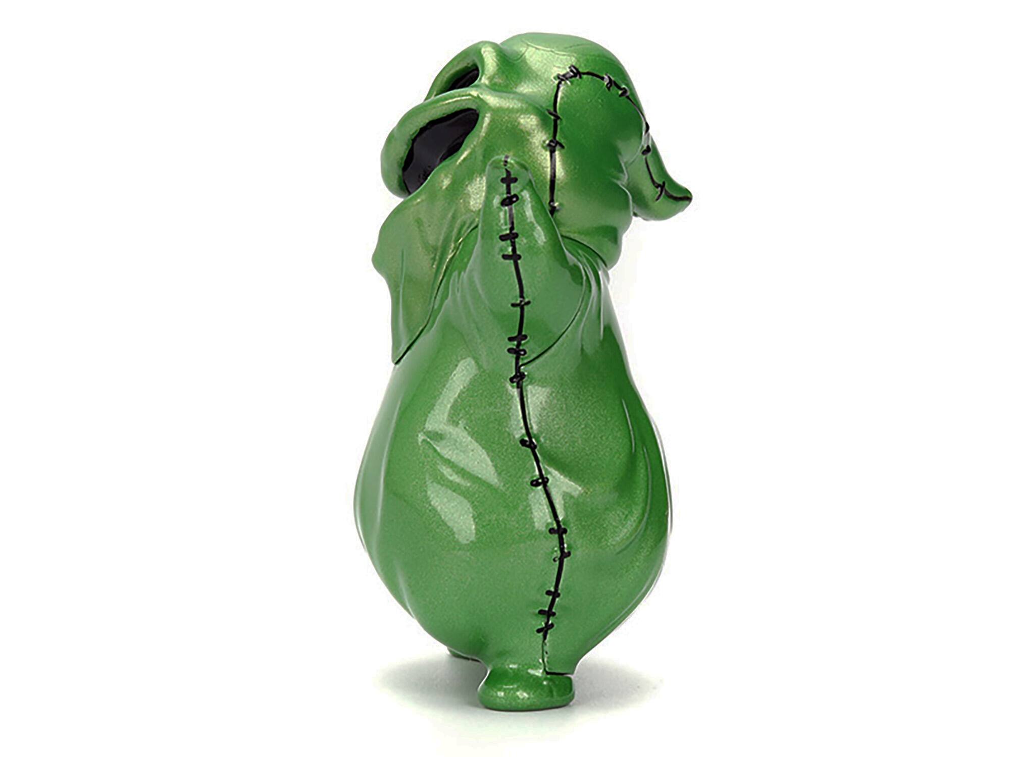 Left. Jada - Oogie Boogie 2.75" Diecast Figure "The Nightmare Before Christmas" (1993) Movie "Metalfigs" Series by Jada - Green.