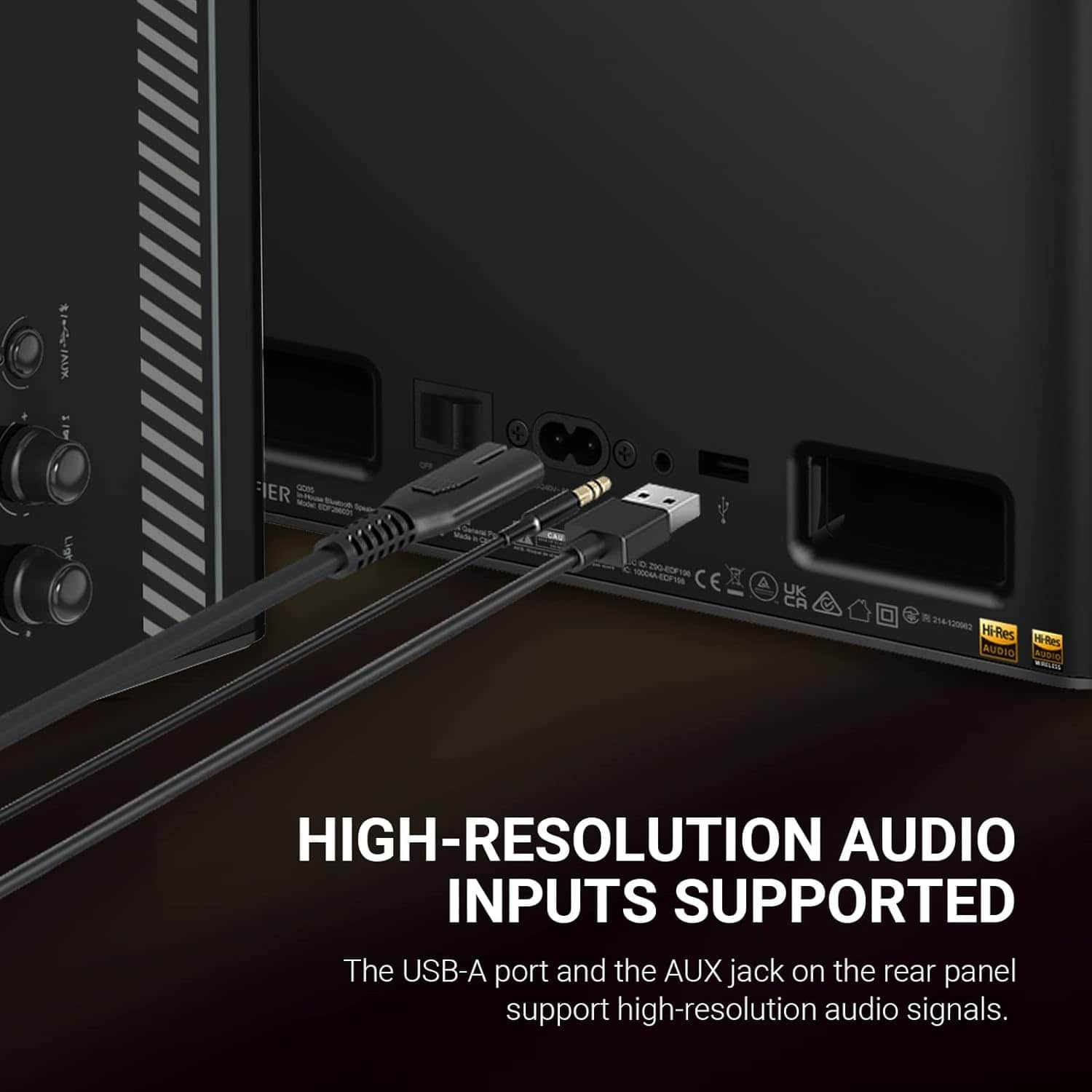 The image features a black speaker with a USB-A port and an AUX jack on the rear panel. The speaker supports high-resolution audio inputs, as indicated by the USB-A port and AUX jack. The speaker is designed to provide high-quality audio output, making it an ideal choice for audiophiles and music enthusiasts.