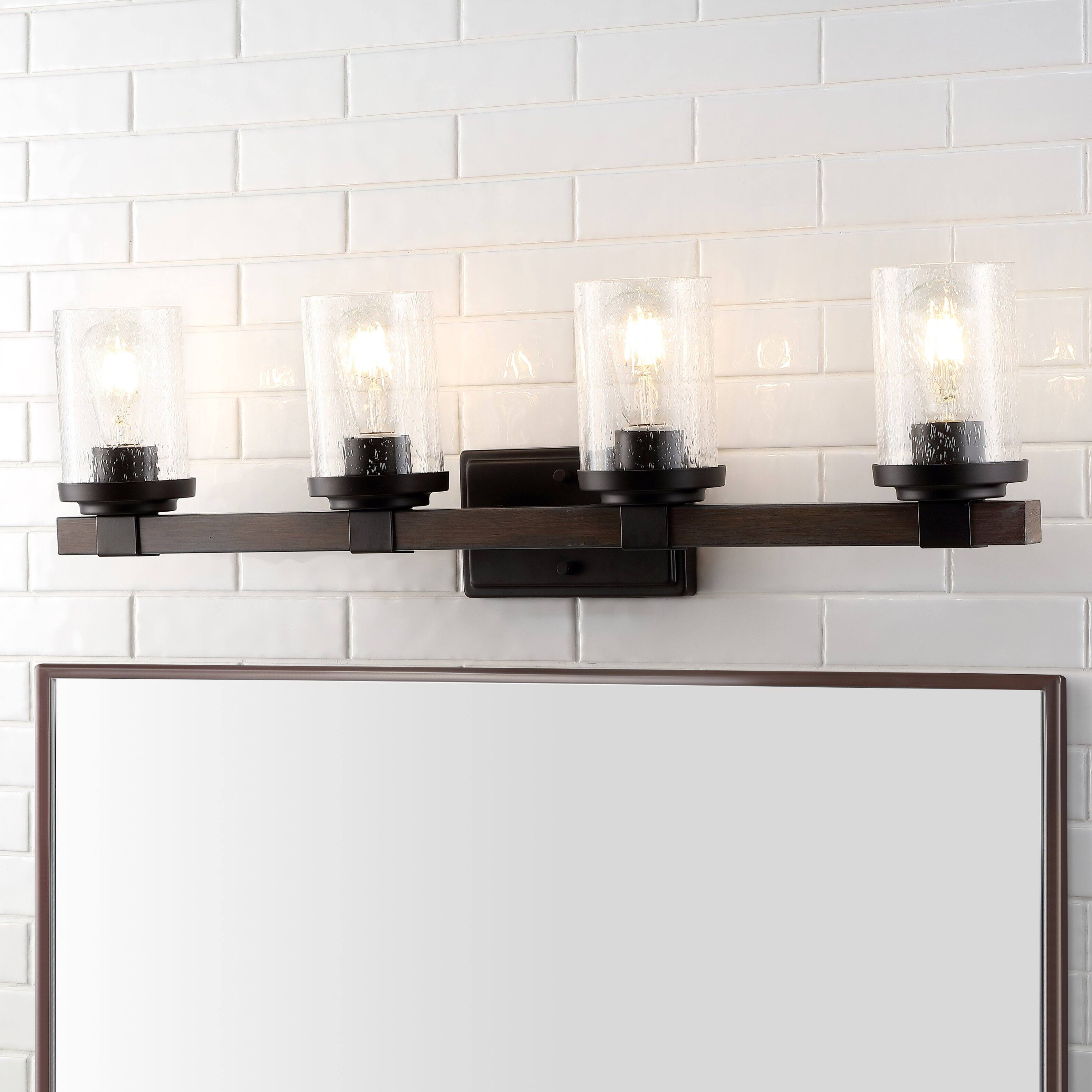 Alt View 1. Jonathan Y - Bungalow 32" 4-Light Iron/Seeded Glass Rustic Farmhouse LED Vanity Light, Oil Rubbed Bronze - Oil Rubbed Bronze.