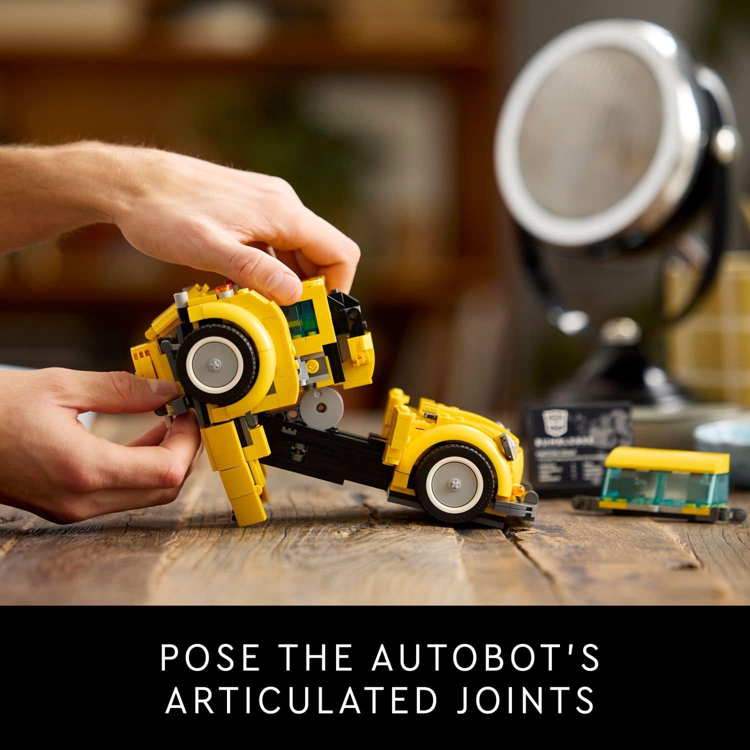 Pose the Autobot's articulated joints