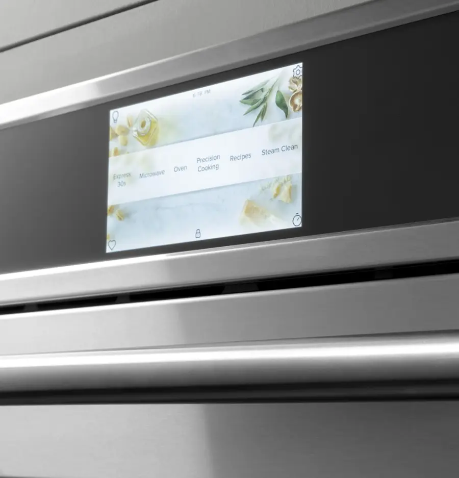 The image shows a digital display on a stainless steel oven, which is displaying the time as 6:16 PM. The display also shows the oven's features, such as precision recipes, steam clean, and oven cooking, along with a microwave function that can be used in just 30 seconds.