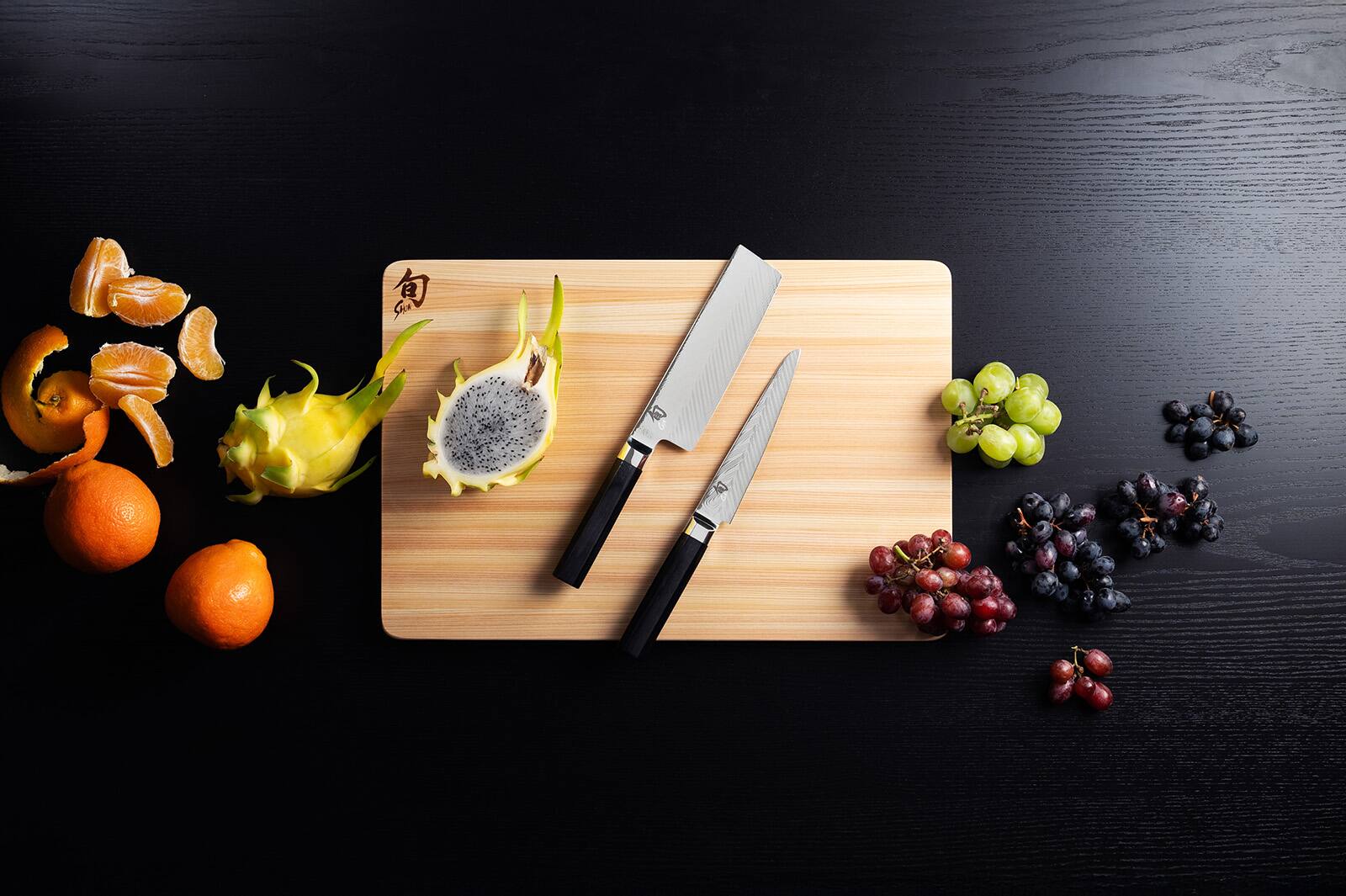 Alt View 5. Shun - Dual Core 6-Inch Utility Butcher Knife VG0019 - Black.