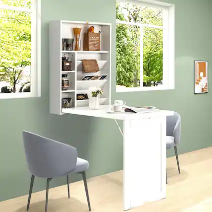 The image features a small desk with a chair, a window, and a bookshelf. The bookshelf is filled with various items, including books, cups, and vases. There are also two cups placed on the desk, and a chair is positioned in front of the desk. The scene appears to be a cozy workspace or reading area.