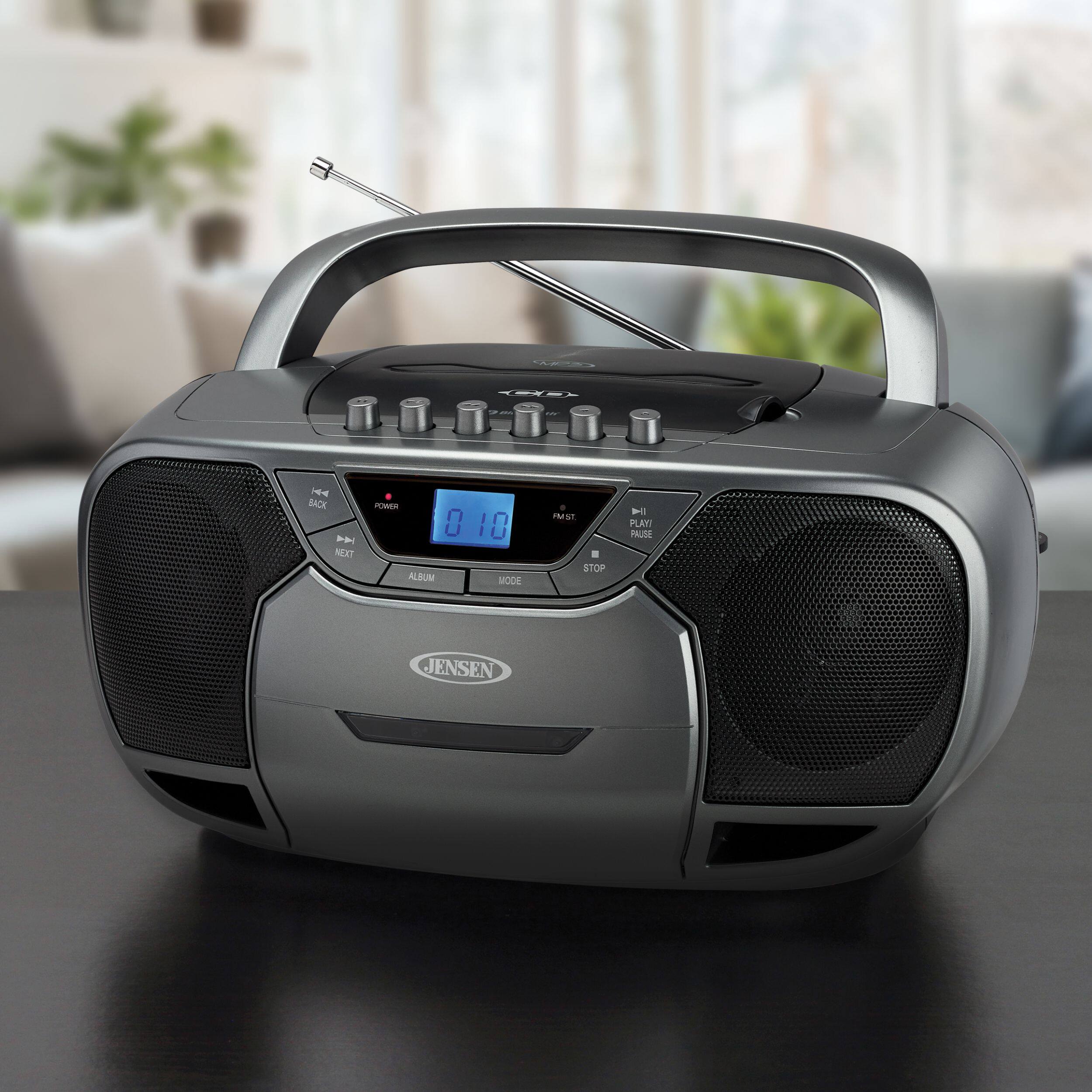 The text on the image reads:

"THE i - ---0-0- BACK POWER 0 10 ALBUM MODE STOP PLAY PAUSE NEXT ALBUM JENSEN"