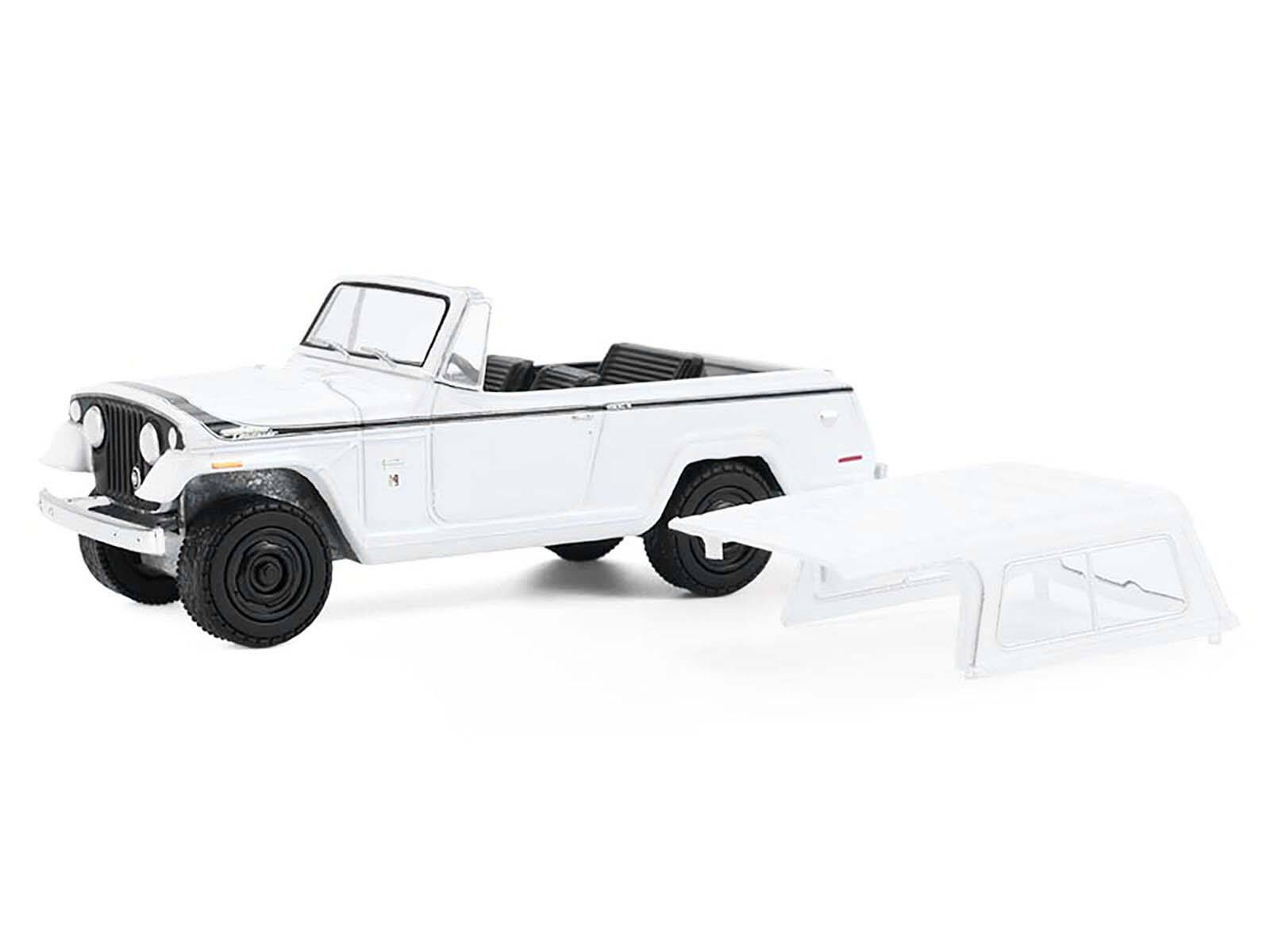 Alt View 1. Greenlight - 1971 Jeep Jeepster Commando White with Black Stripes "All Terrain" Series 1/64 Diecast Model Car by Greenlight.