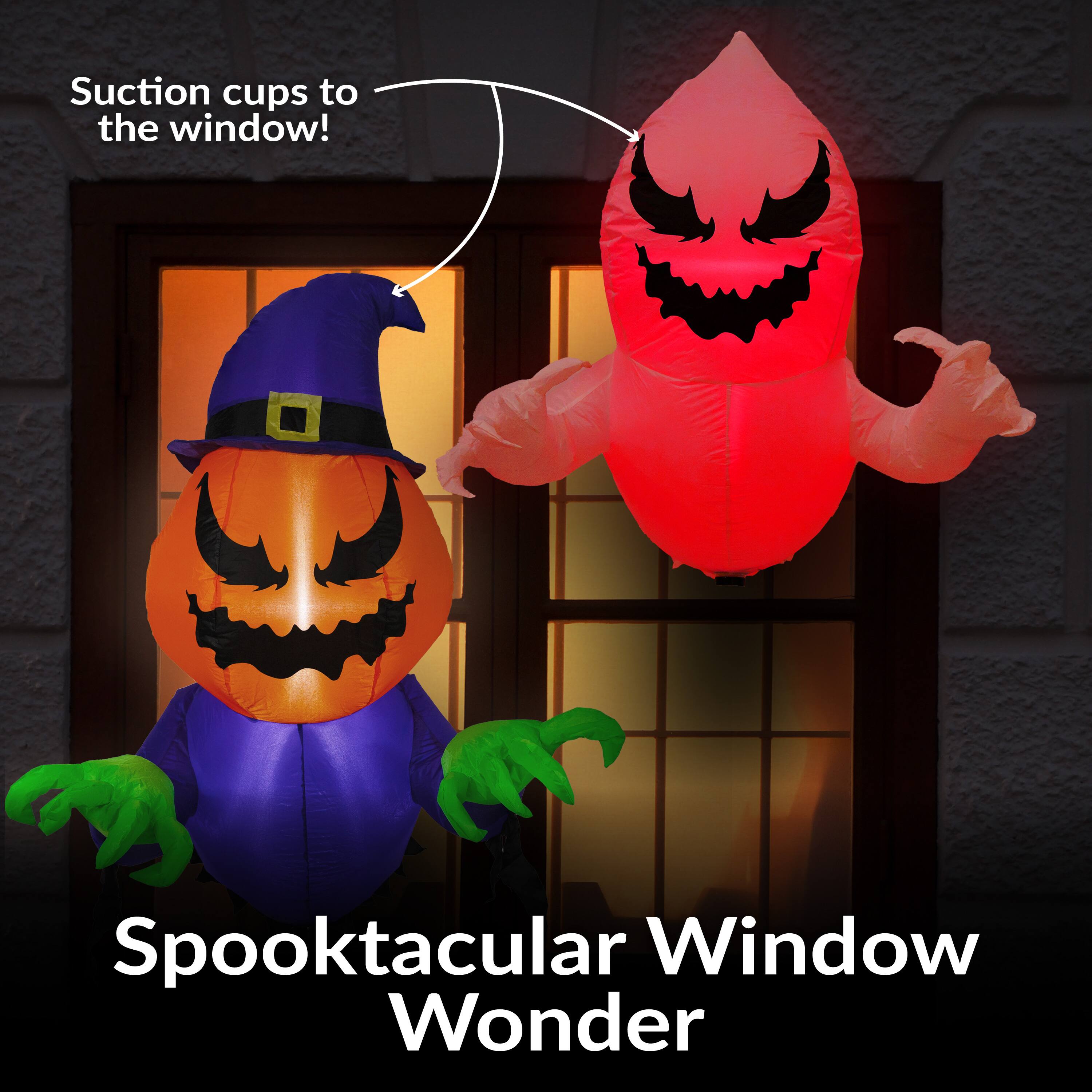 Suction cups to the window!

Spooktacular Window Wonder