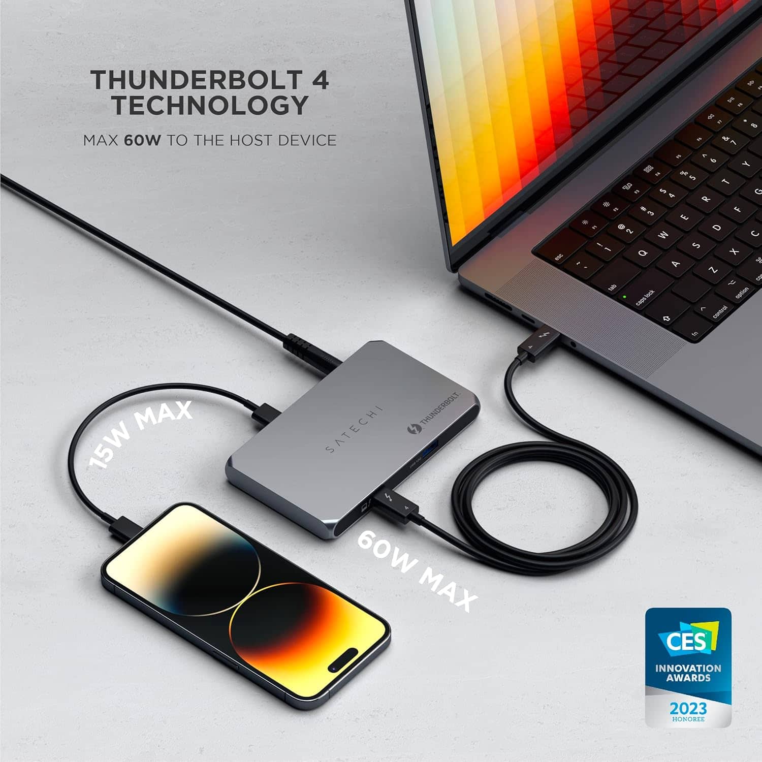 The text on the image reads: "Thunderbolt 4 Technology MAX 60W to the Host Device I 2 e g . a - * - F e 1 I 2 of u N S . un - ar . - F - F E . - . a D M - i - x a . 4 Z 4 B g I ne 4 I . a MAX 15W Thunderbolt Satechi I 60W MAX CES Innovation Awards 2023 Monoree."